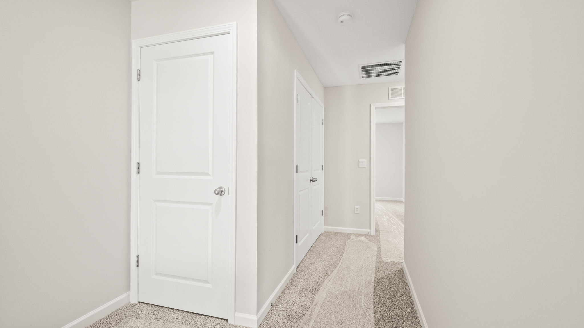 Hallway with closet door