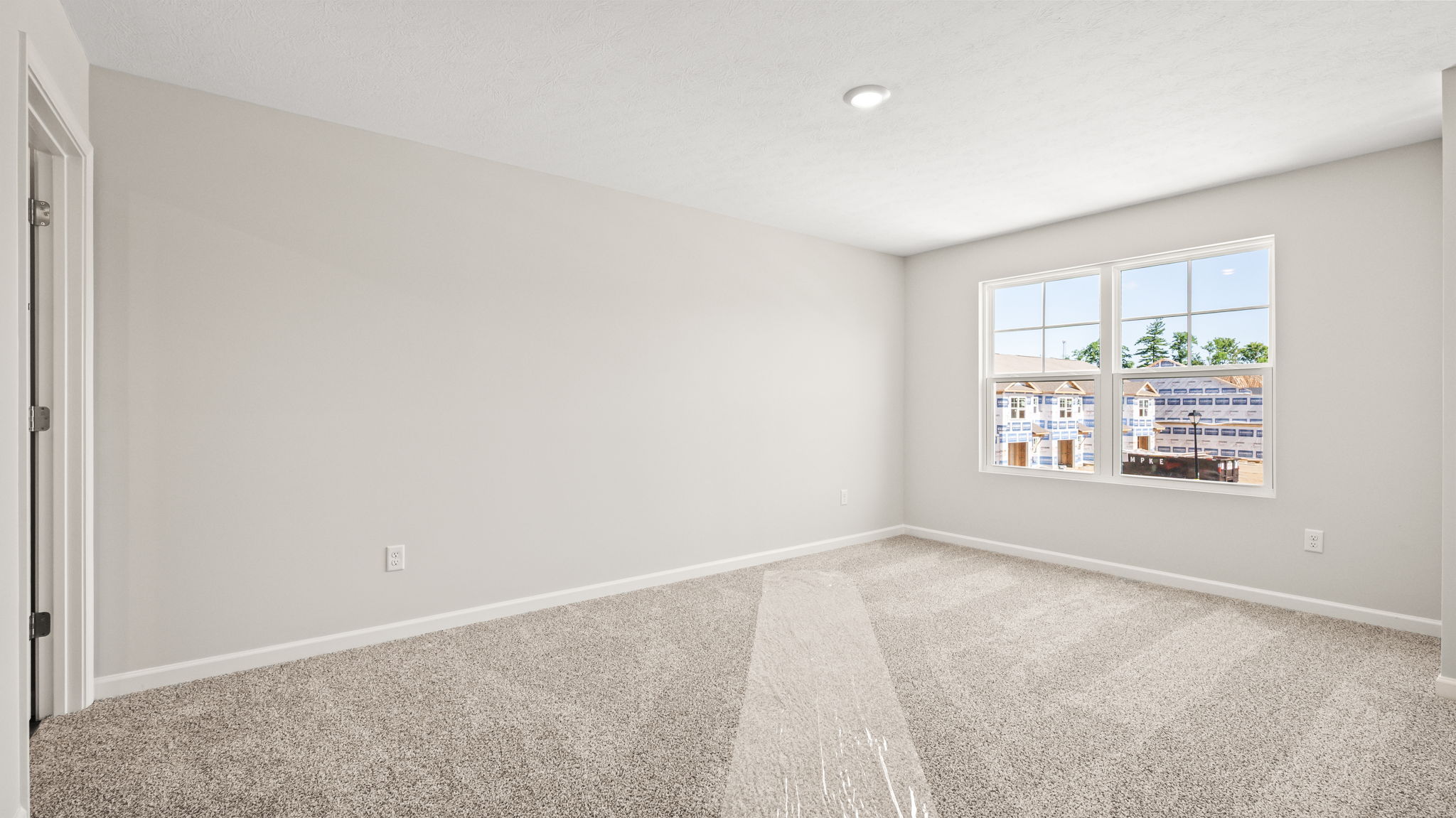 Primary bedroom with window