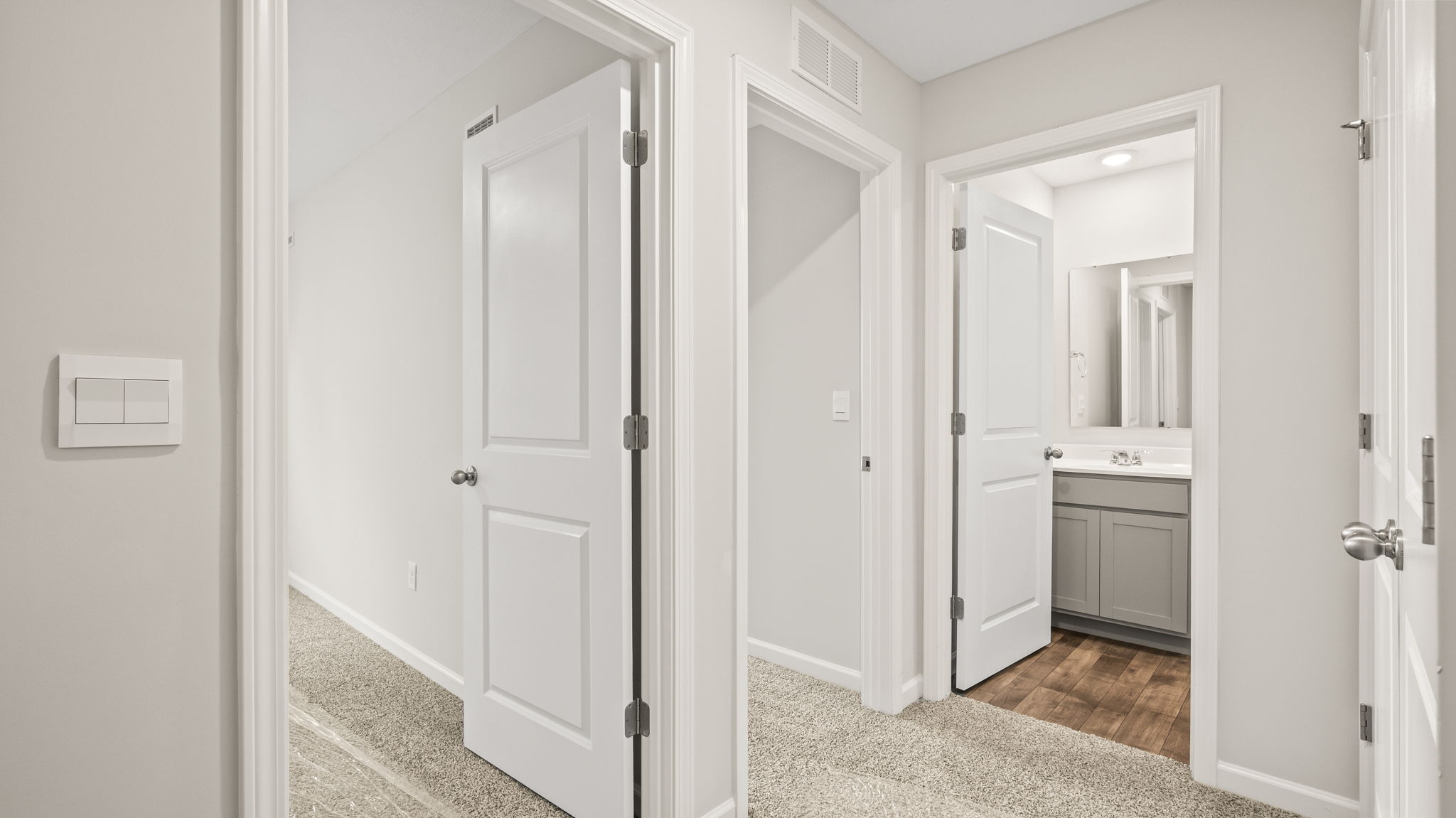 Upstairs hallway leading to bedroom and bathroom