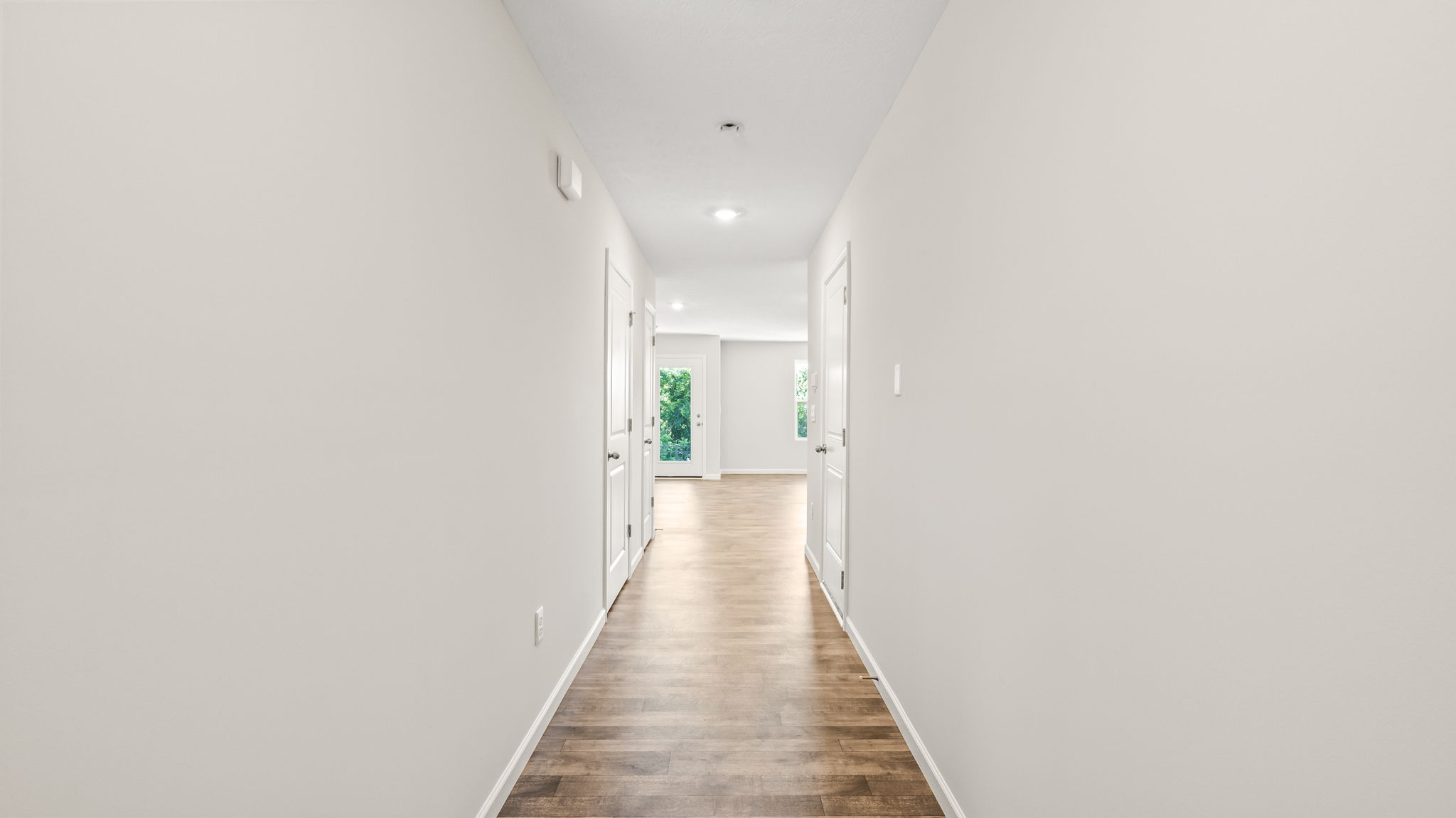 Foyer of townhome leading to great room