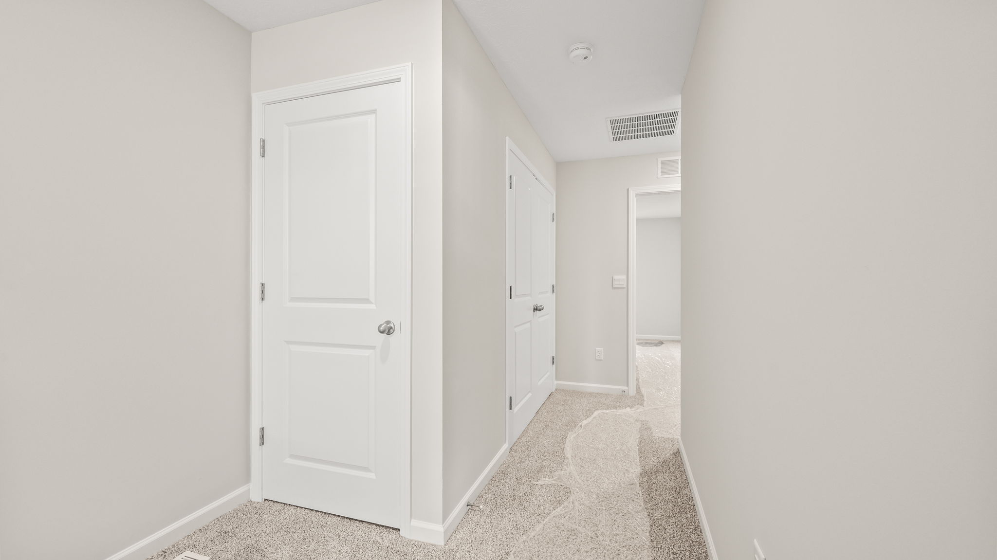 Hallway with closet door