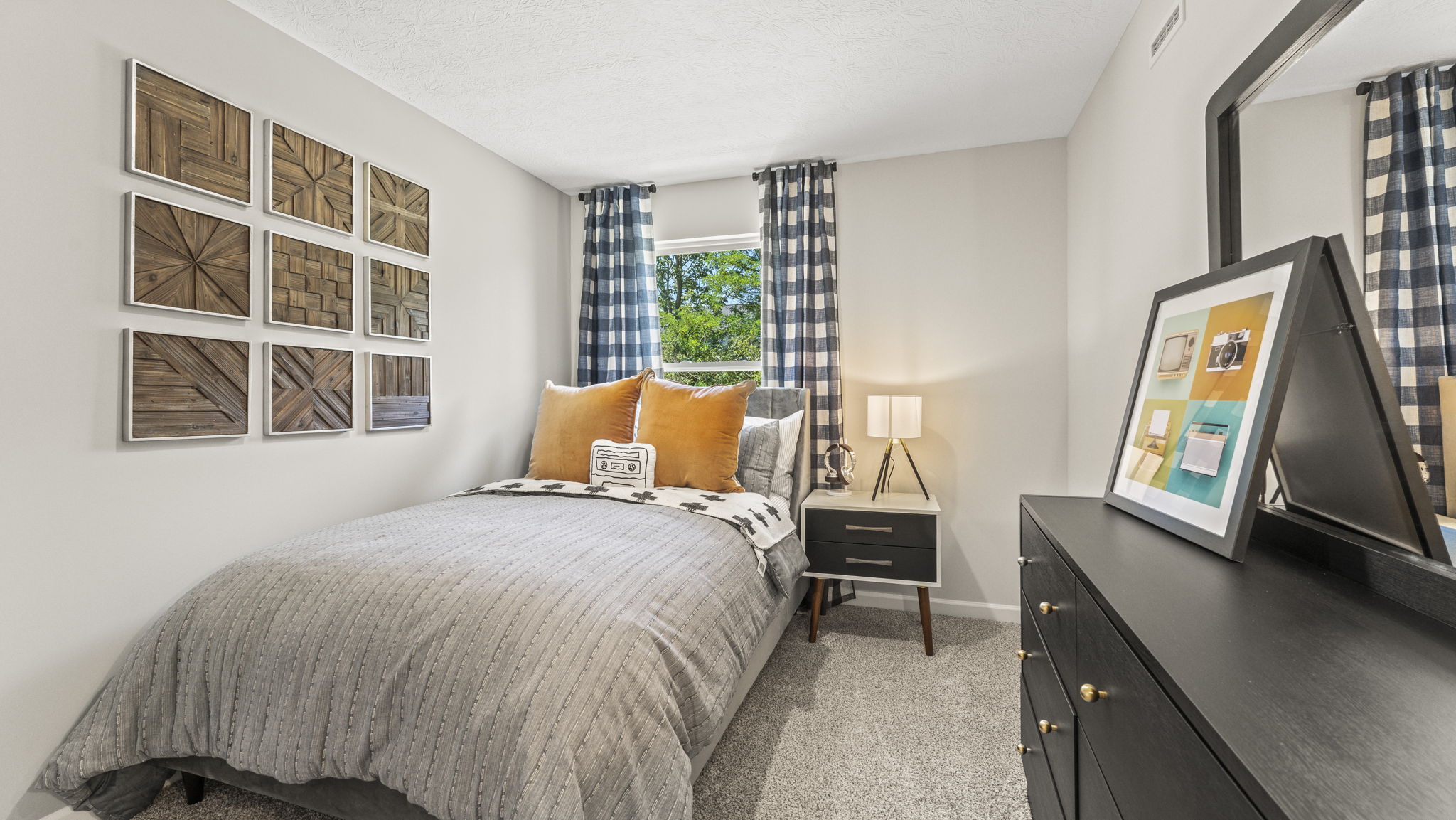 Full view of decorated bedroom.
