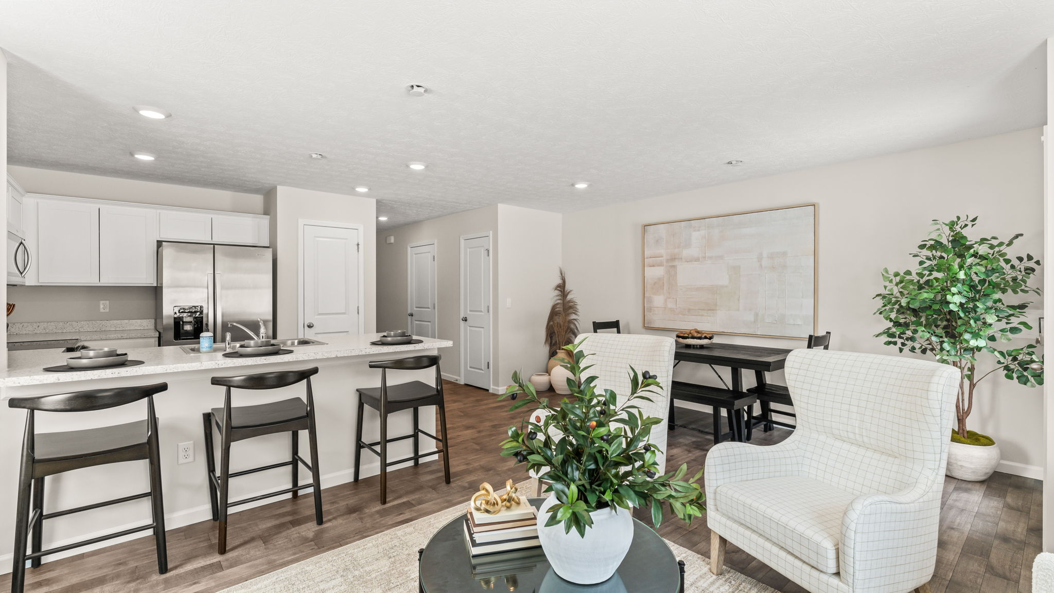 Kitchen and dining room of an elevated modern townhome