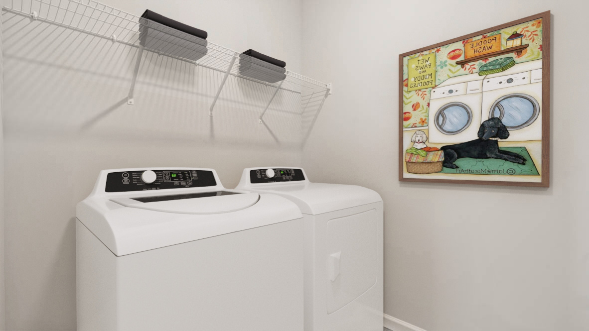 Laundry room with Whirlpool stainless steel appliances.