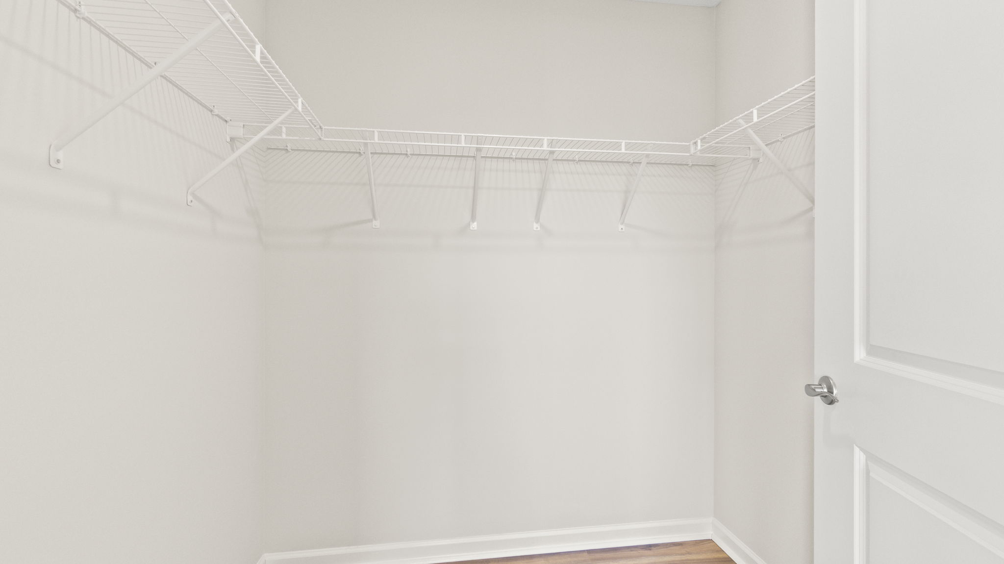 Walk-in closet with wire shelving