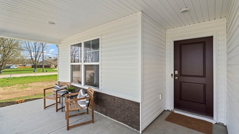 Georgetown Village in Eaton OH Model Home front porch and furniture