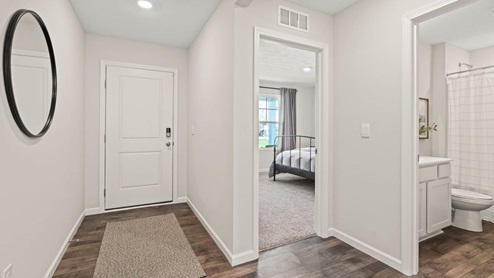foyer with bathroom and bedroom