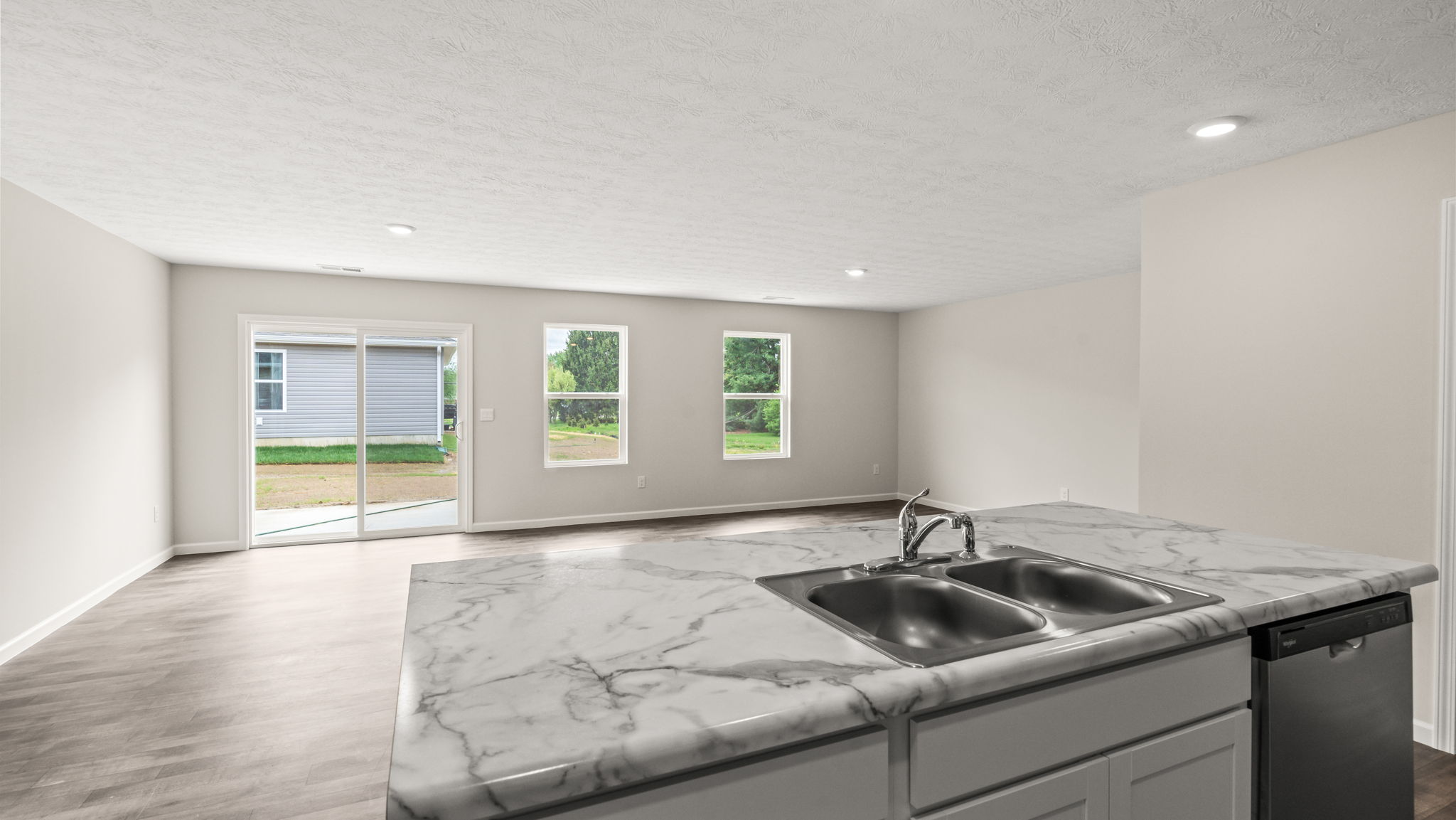 View of backyard from kitchen.