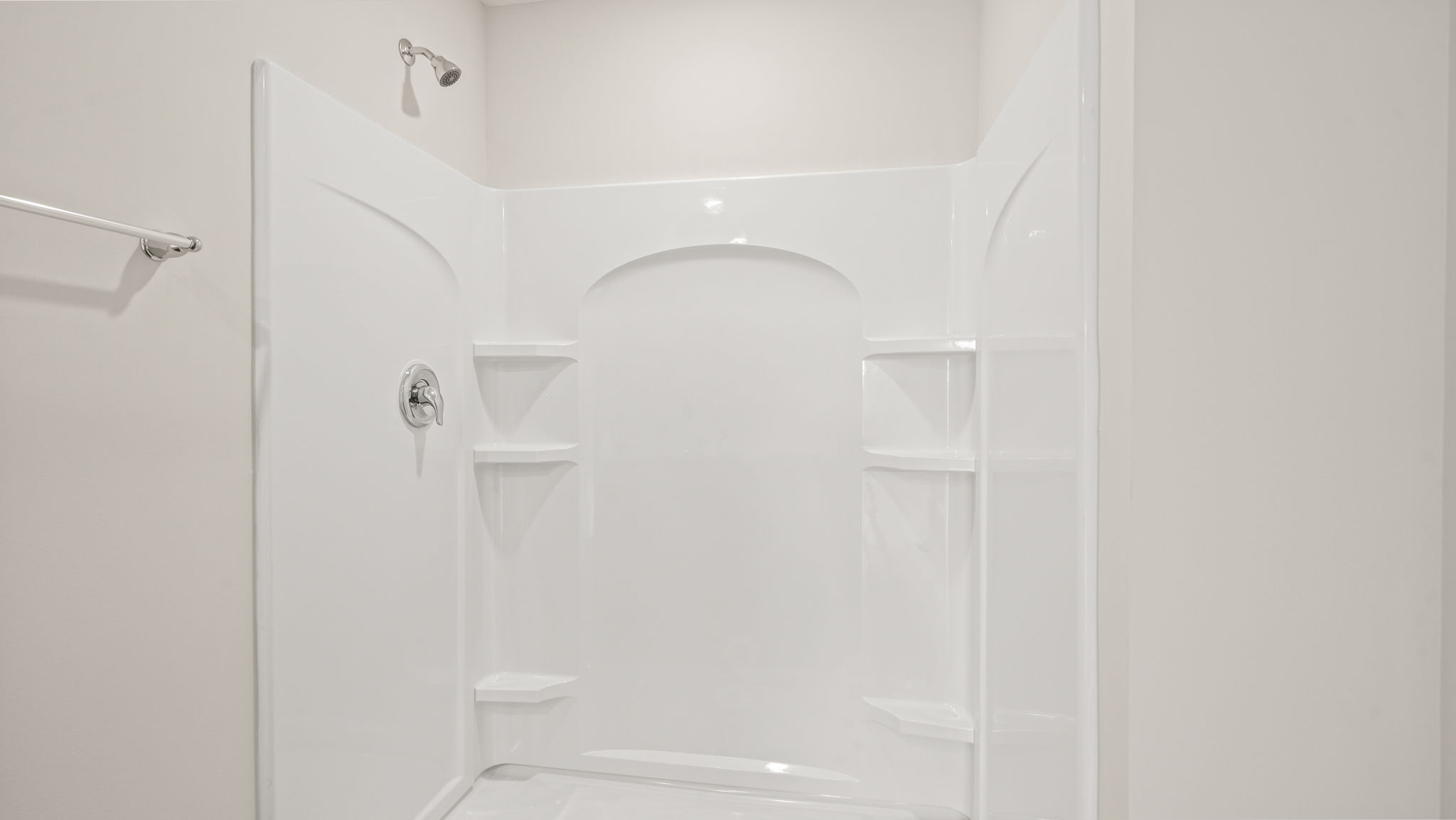 Bathroom with walk in shower.