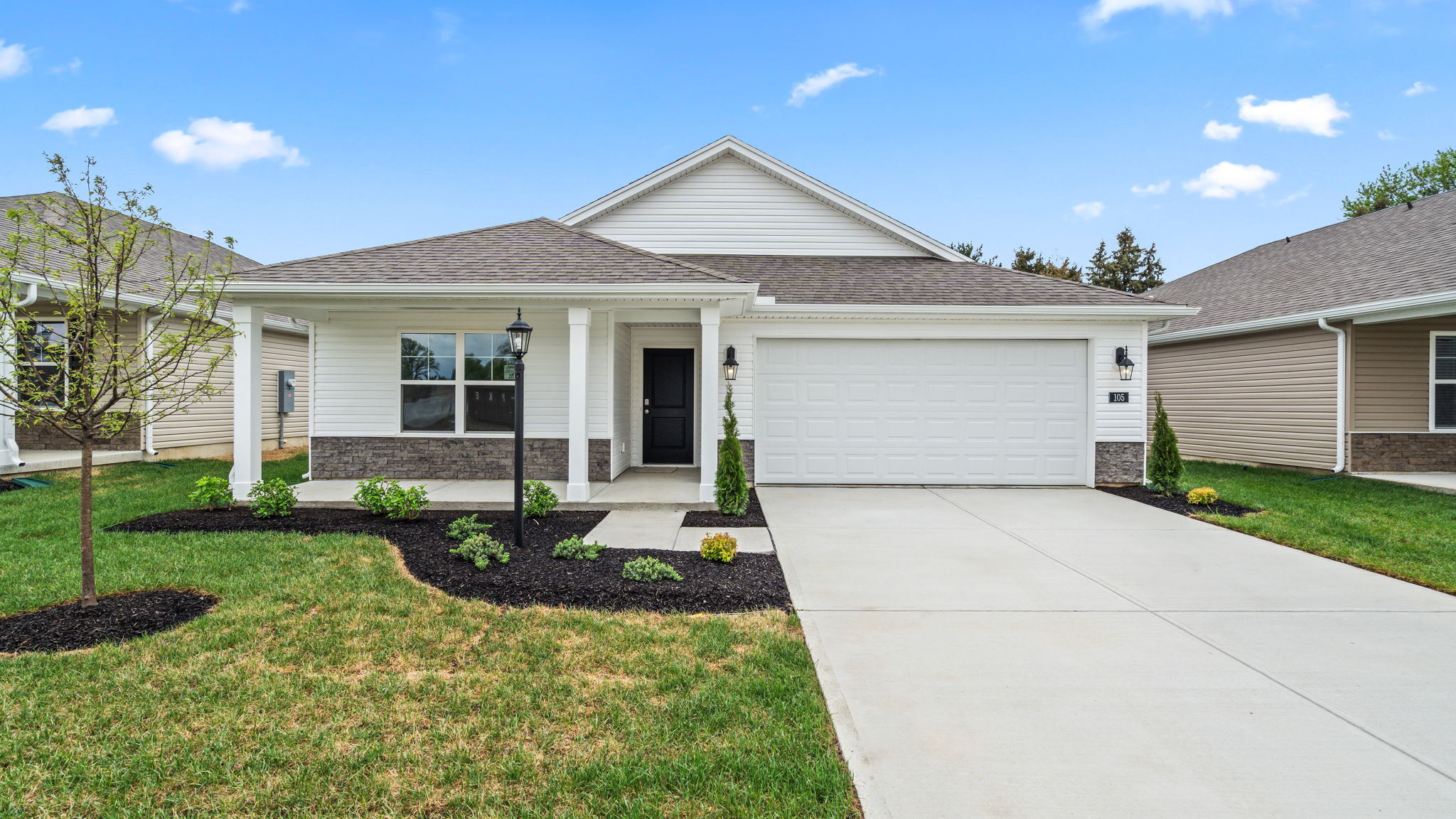 Front view of home with covered front patio.