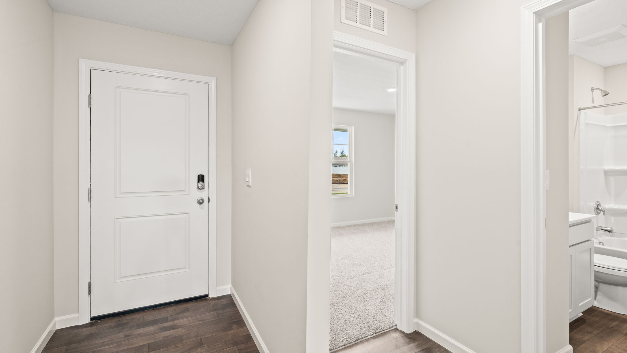 View of front bedroom and bathroom.
