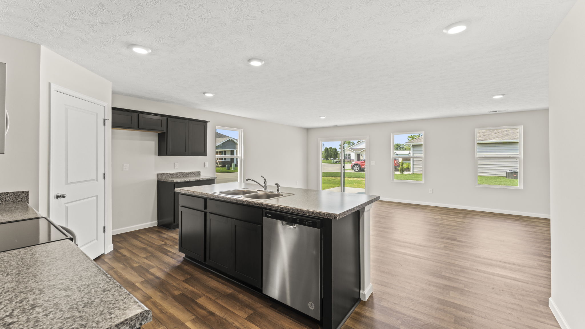 Open concept kitchen with island.