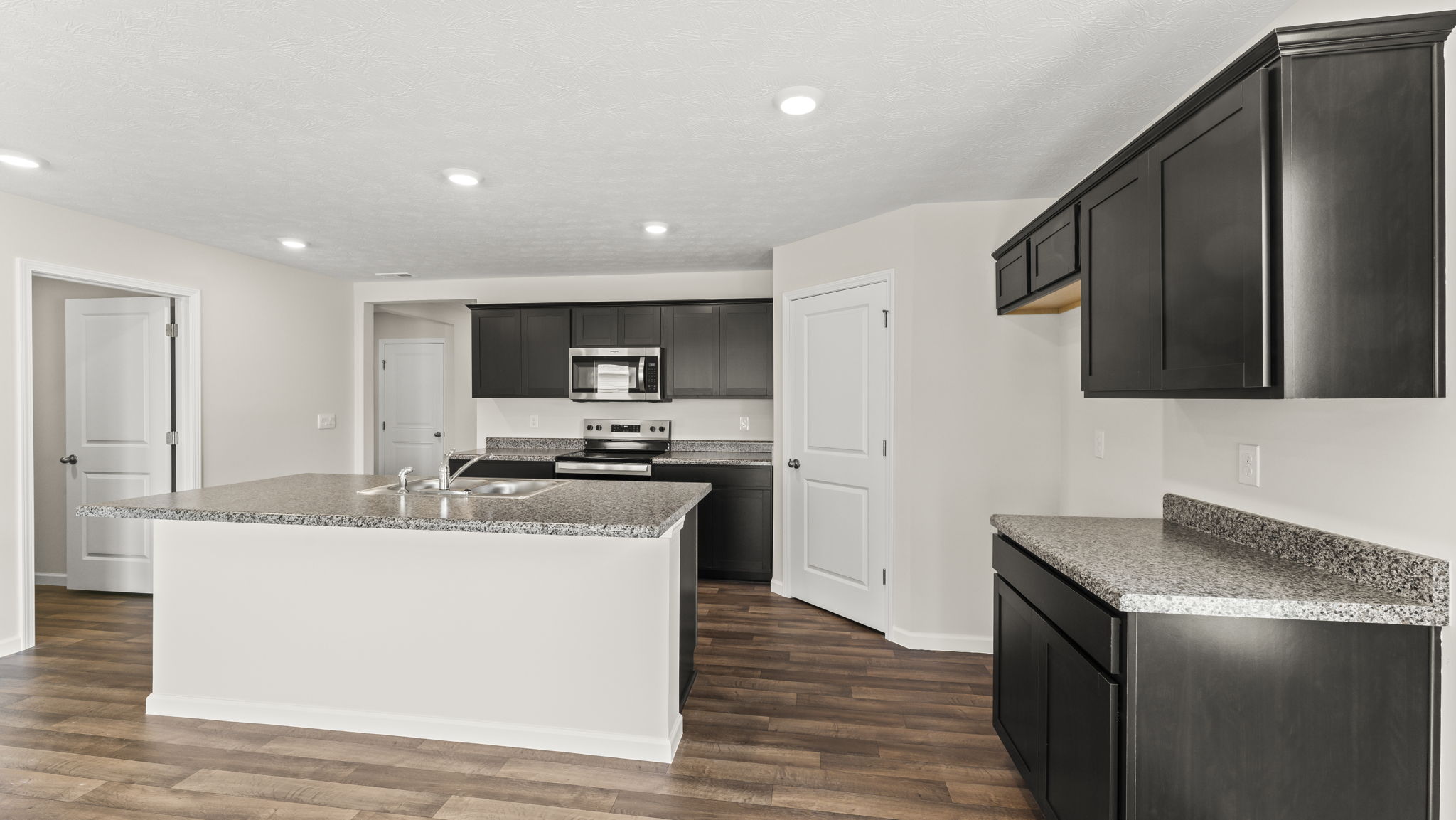 Kitchen with stainless steel appliances.