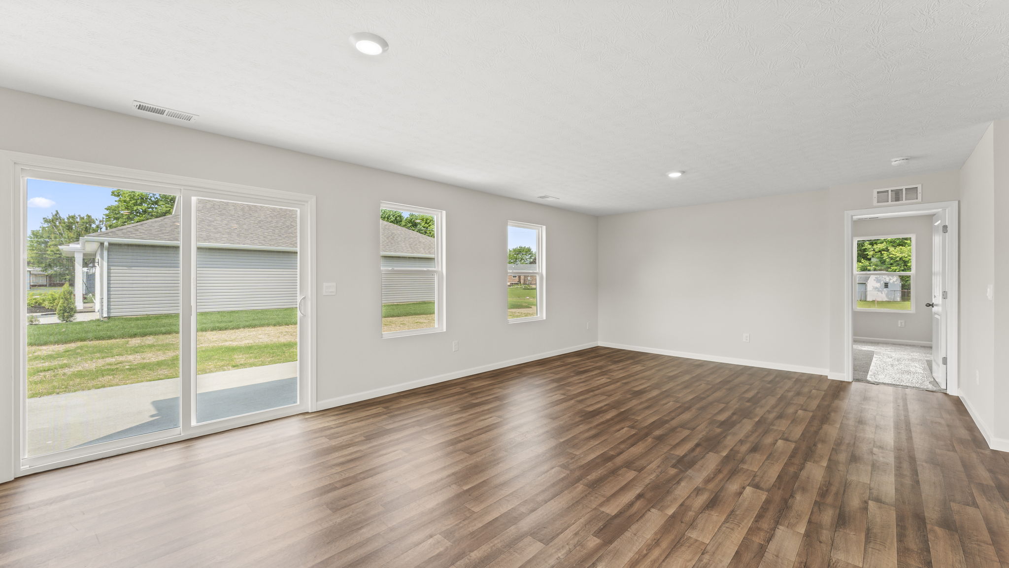 Living room with direct access to backyard.