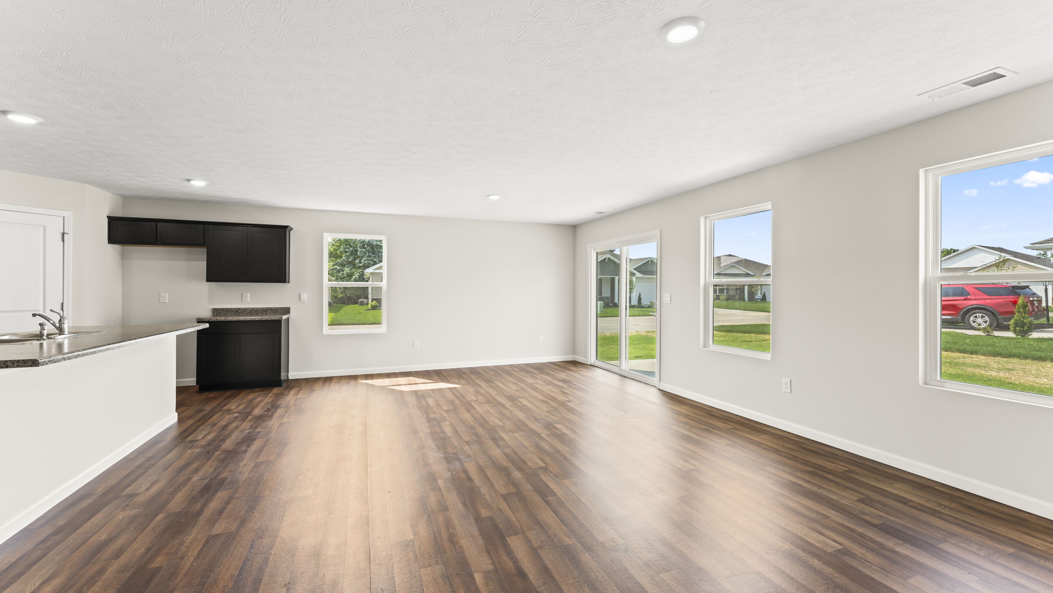 Living room and dining area near kitchen.