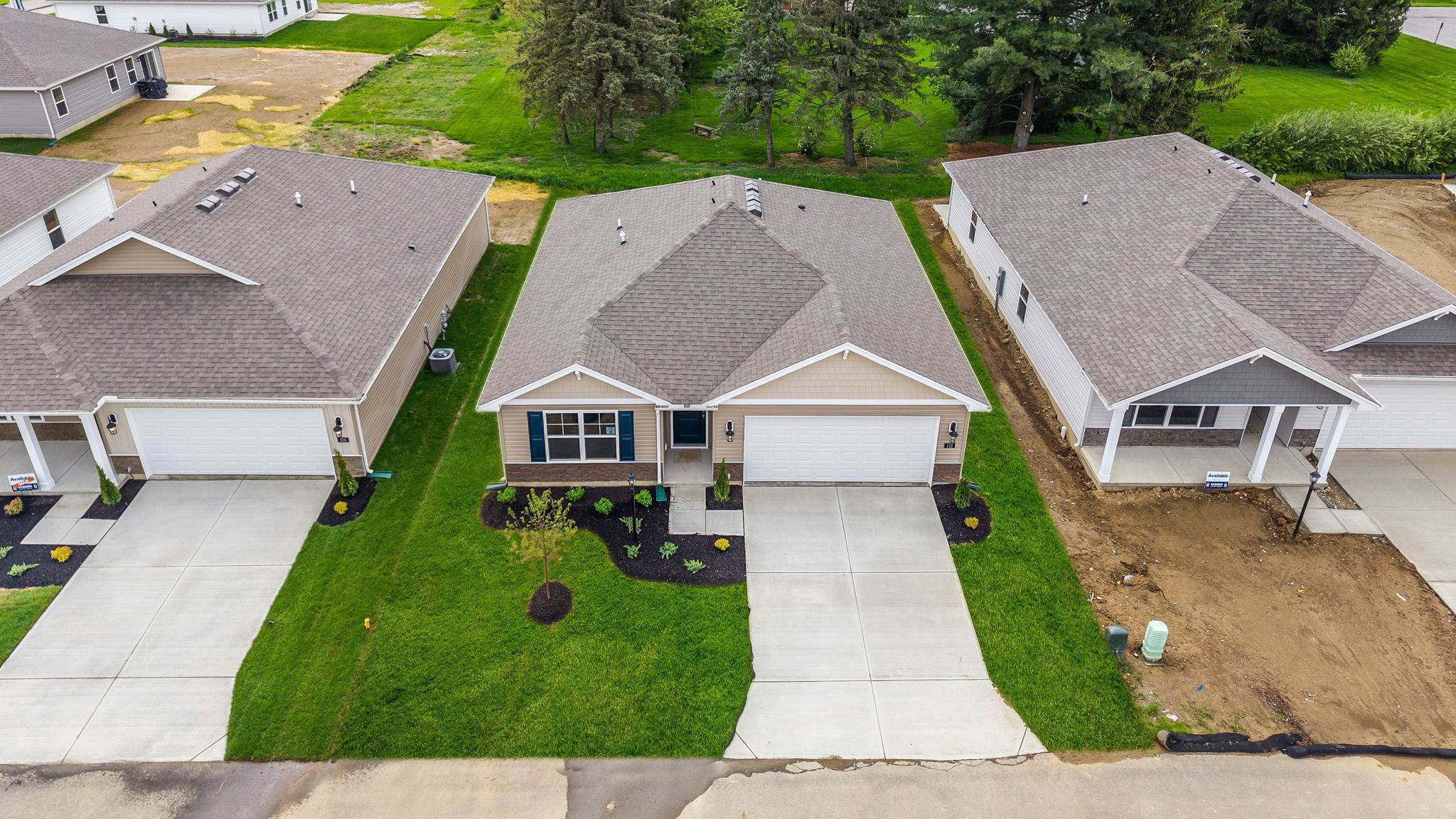 Aerial view of front yard with landscaping.