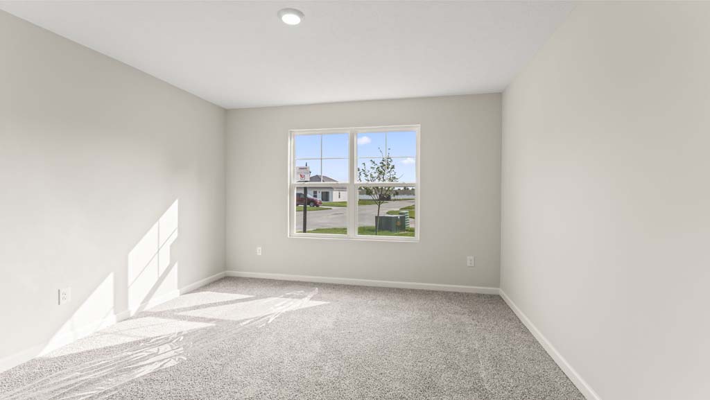 Bedroom with carpeted floors and a large closet.