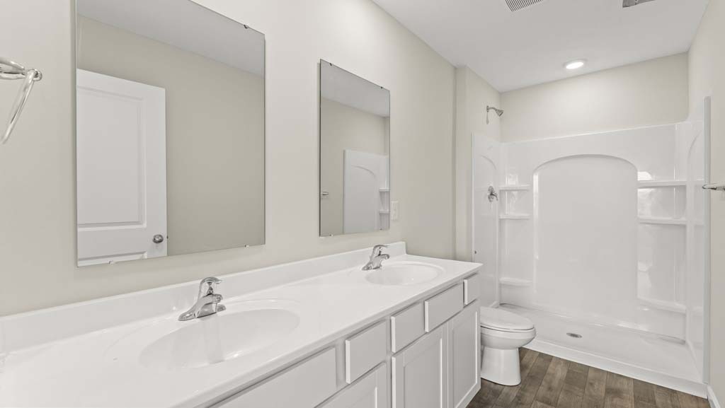 Bathroom with a dual vanity sink.