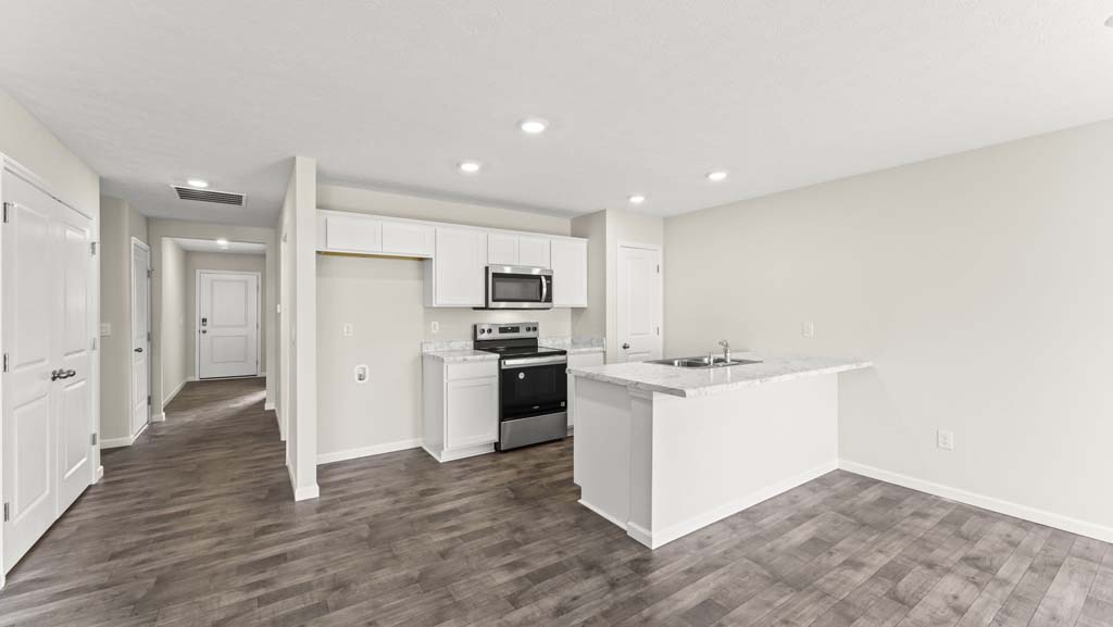 Open concept kitchen with island.