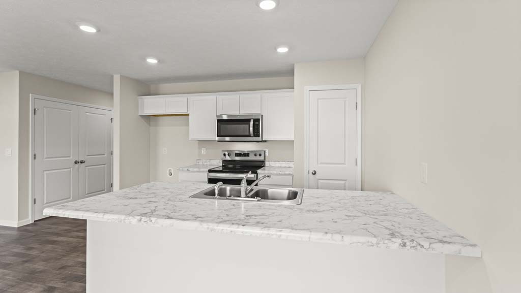 Kitchen with granite countertops.