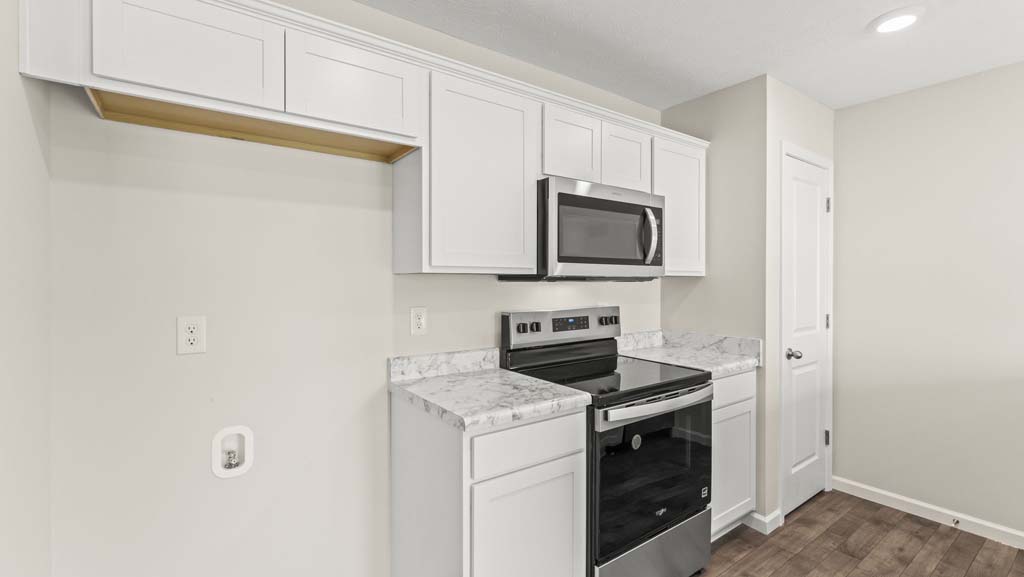Kitchen with stainless steel appliances.