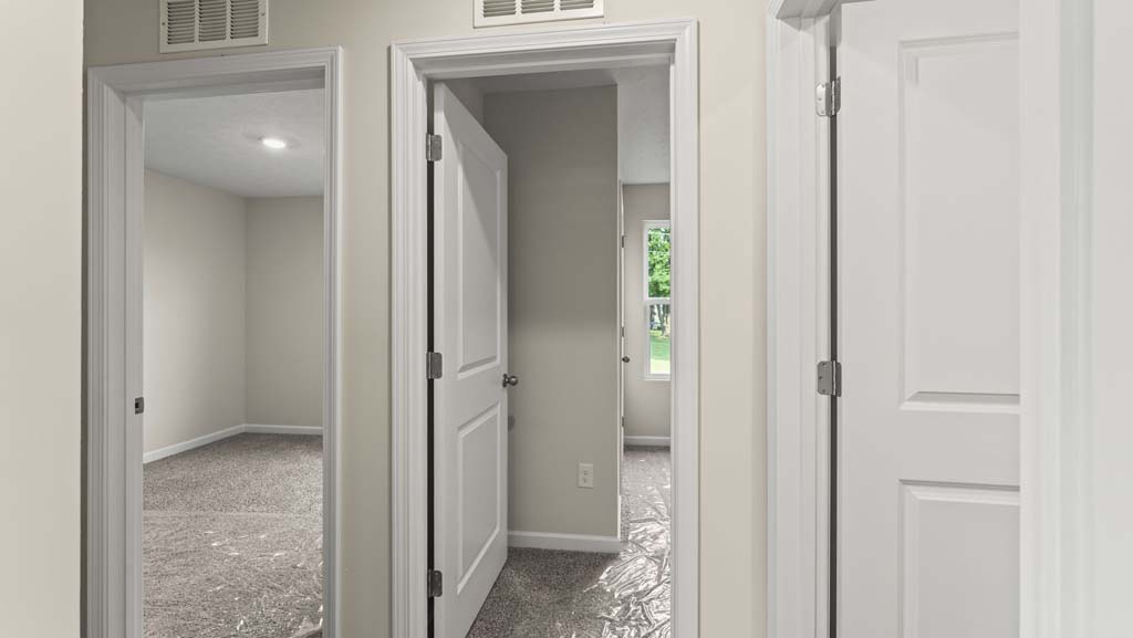 Hallway in between bedrooms and bathroom.