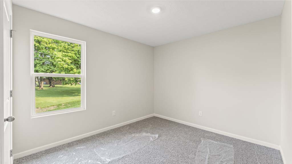 Bedroom with a single window.