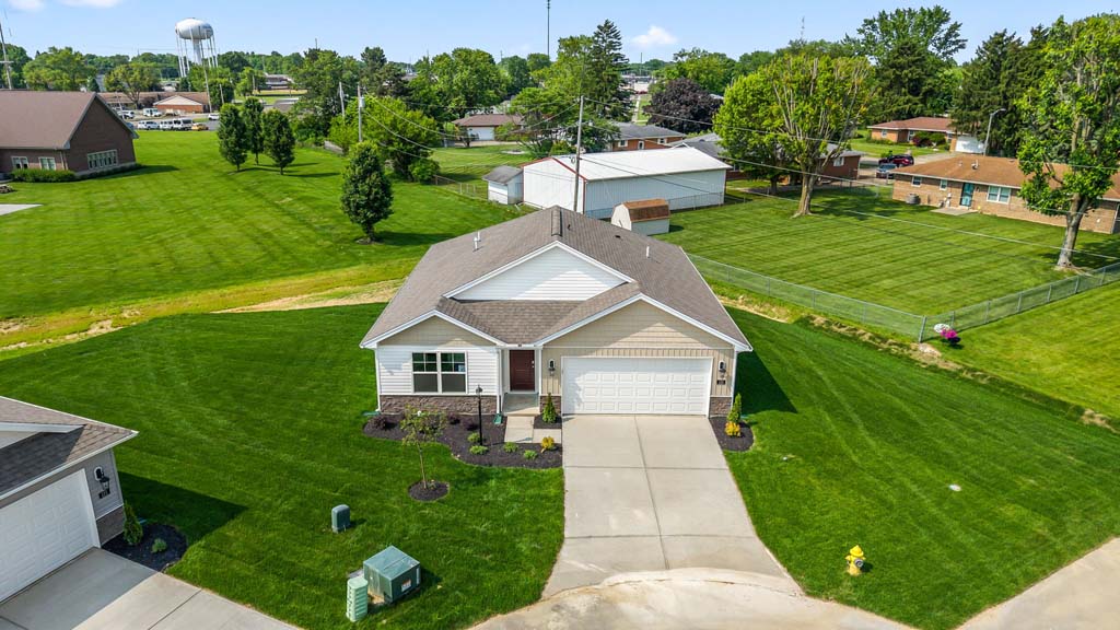 Home with covered front walkway.