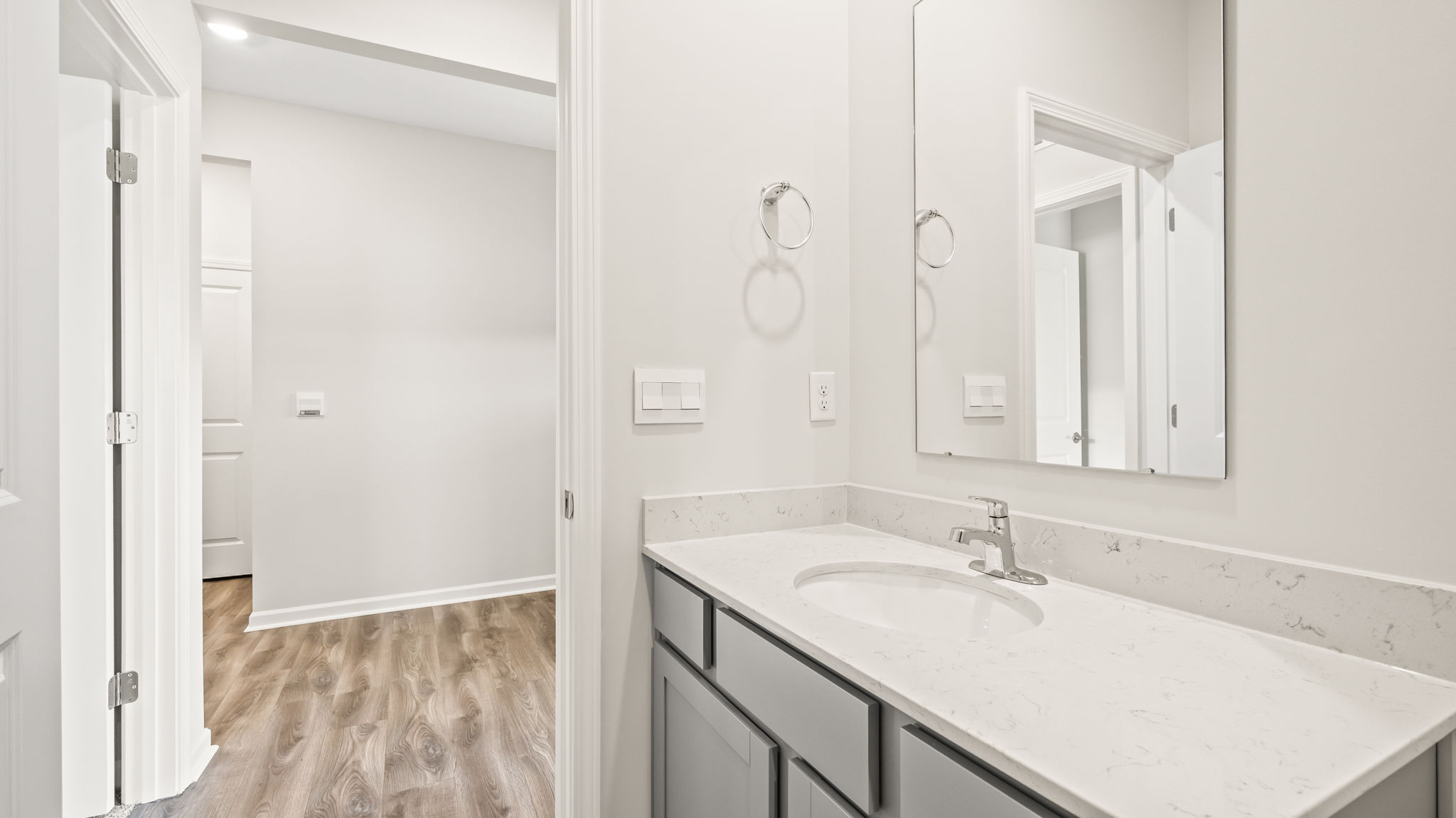 Bathroom with sink and mirror