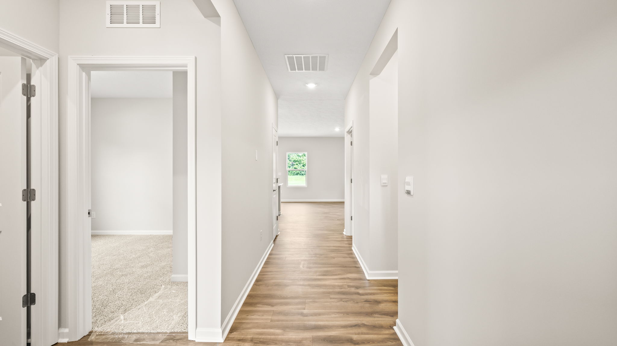 Hallway leading to bedroom and great room