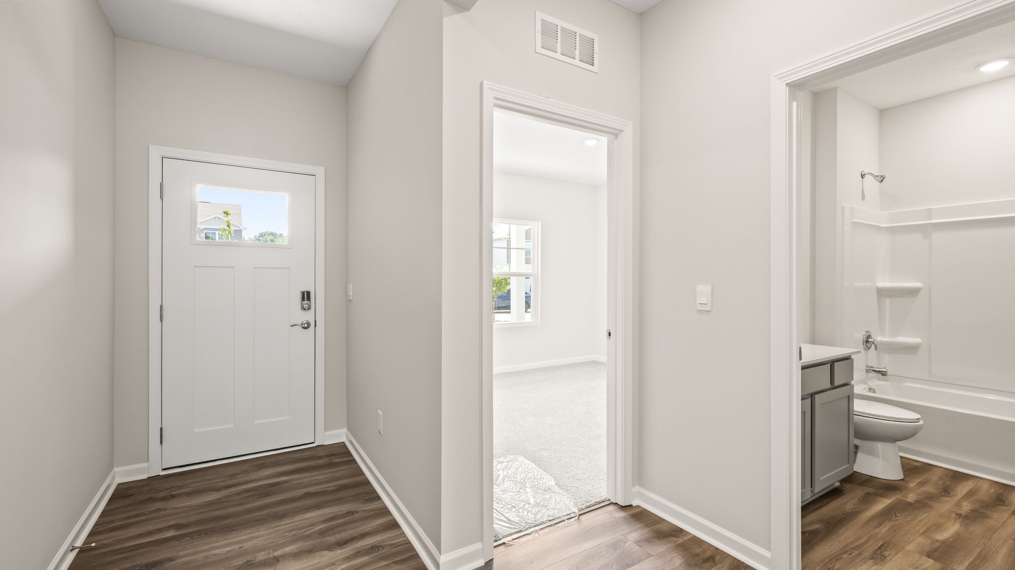 Foyer leading to door