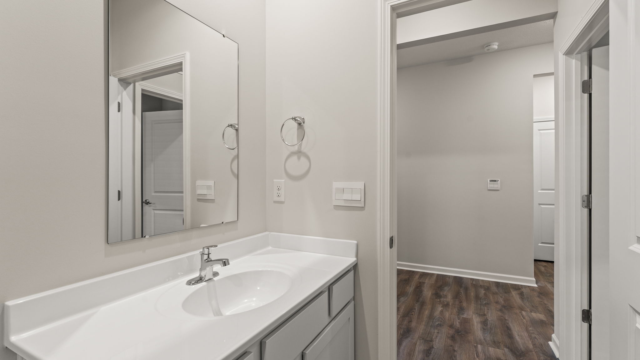 Closeup of bathroom sink and mirror