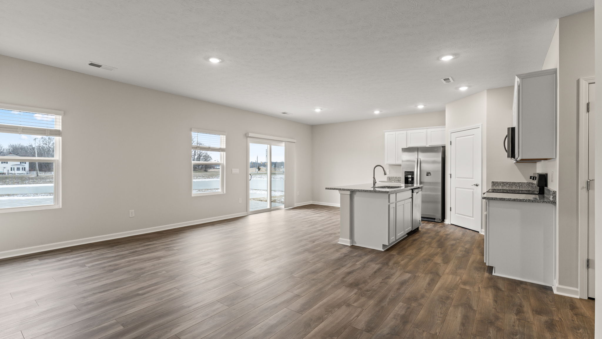 Dining and kitchen area side views.