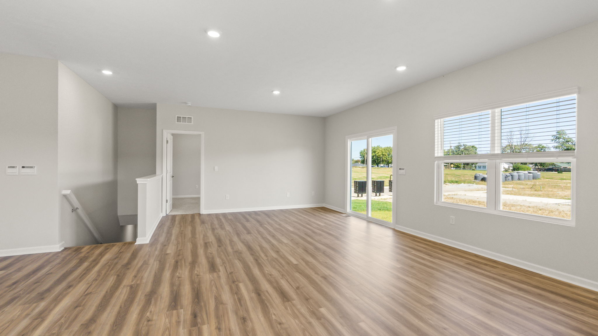 wide angle image of full open concept great room