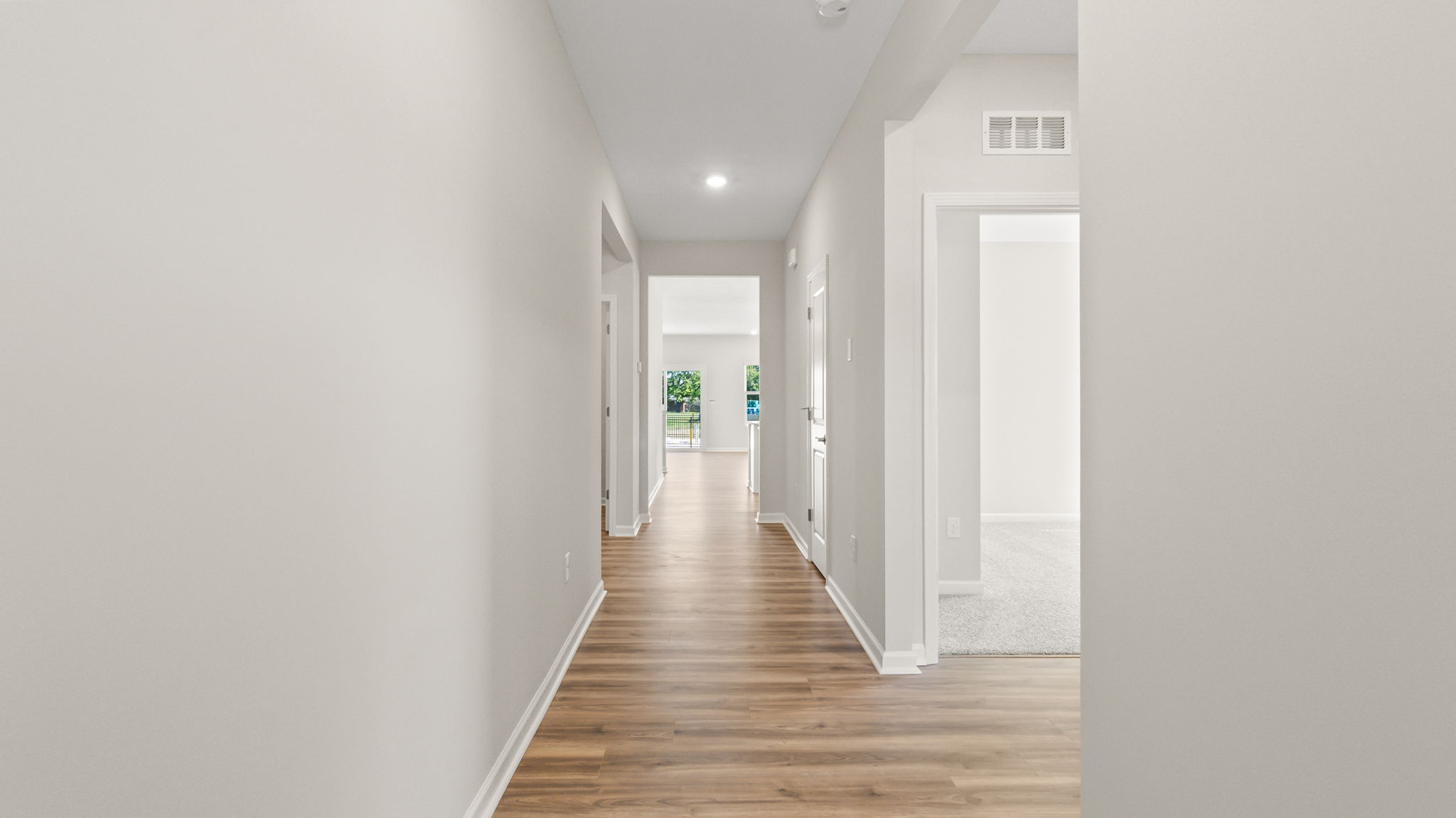 Hallway leading to great room and kitchen