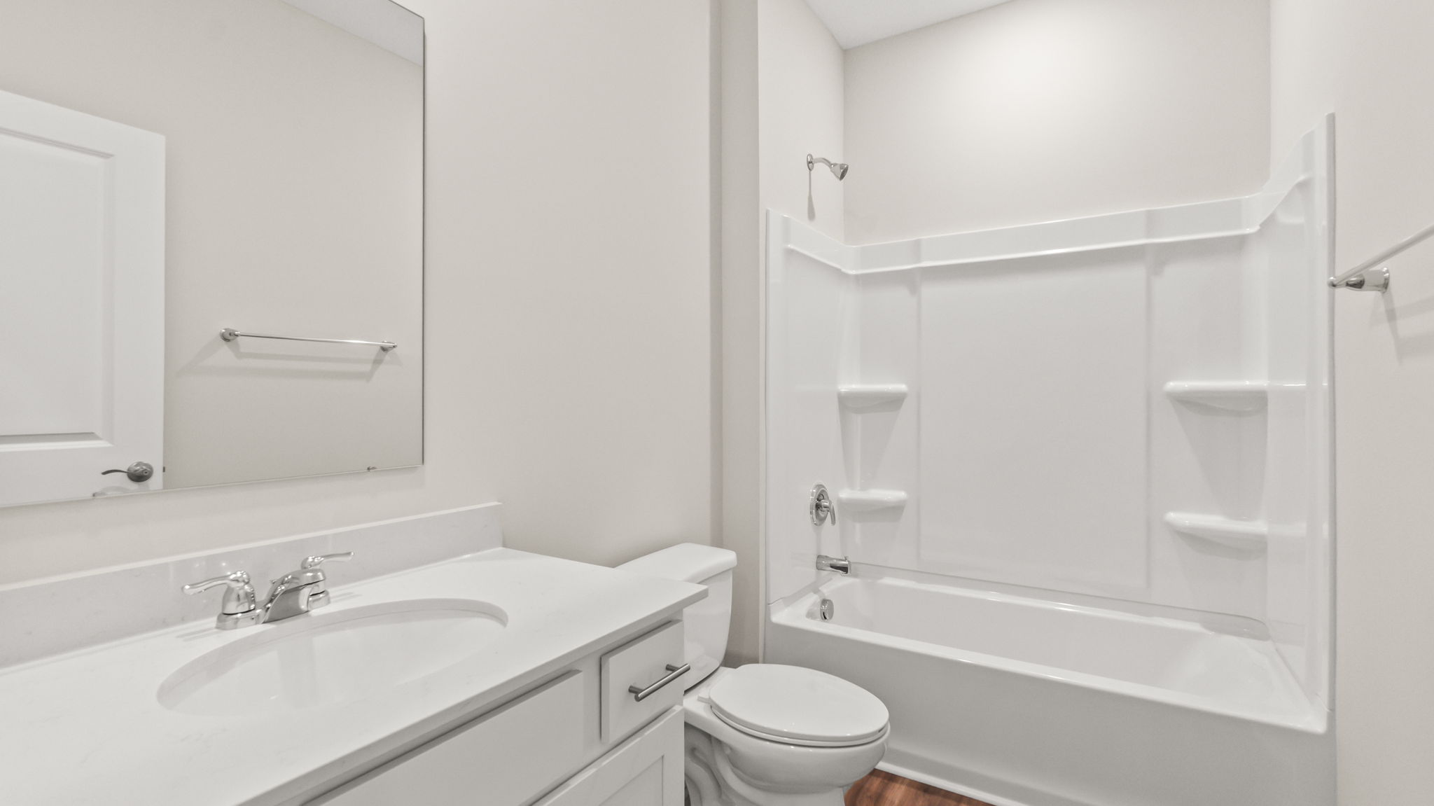 Bathroom with sink, toilet, and tub
