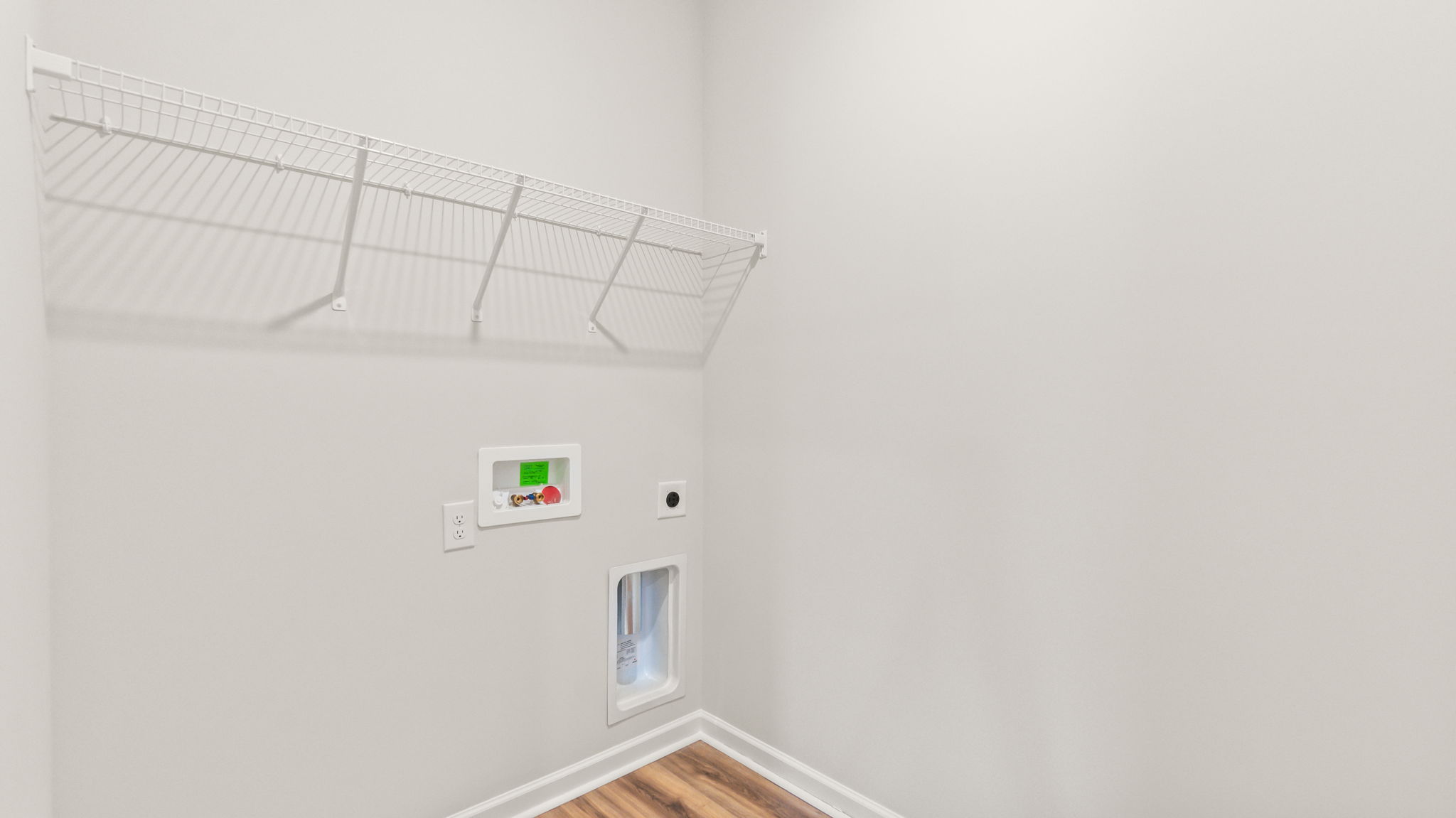 Laundry area with wire rack shelving