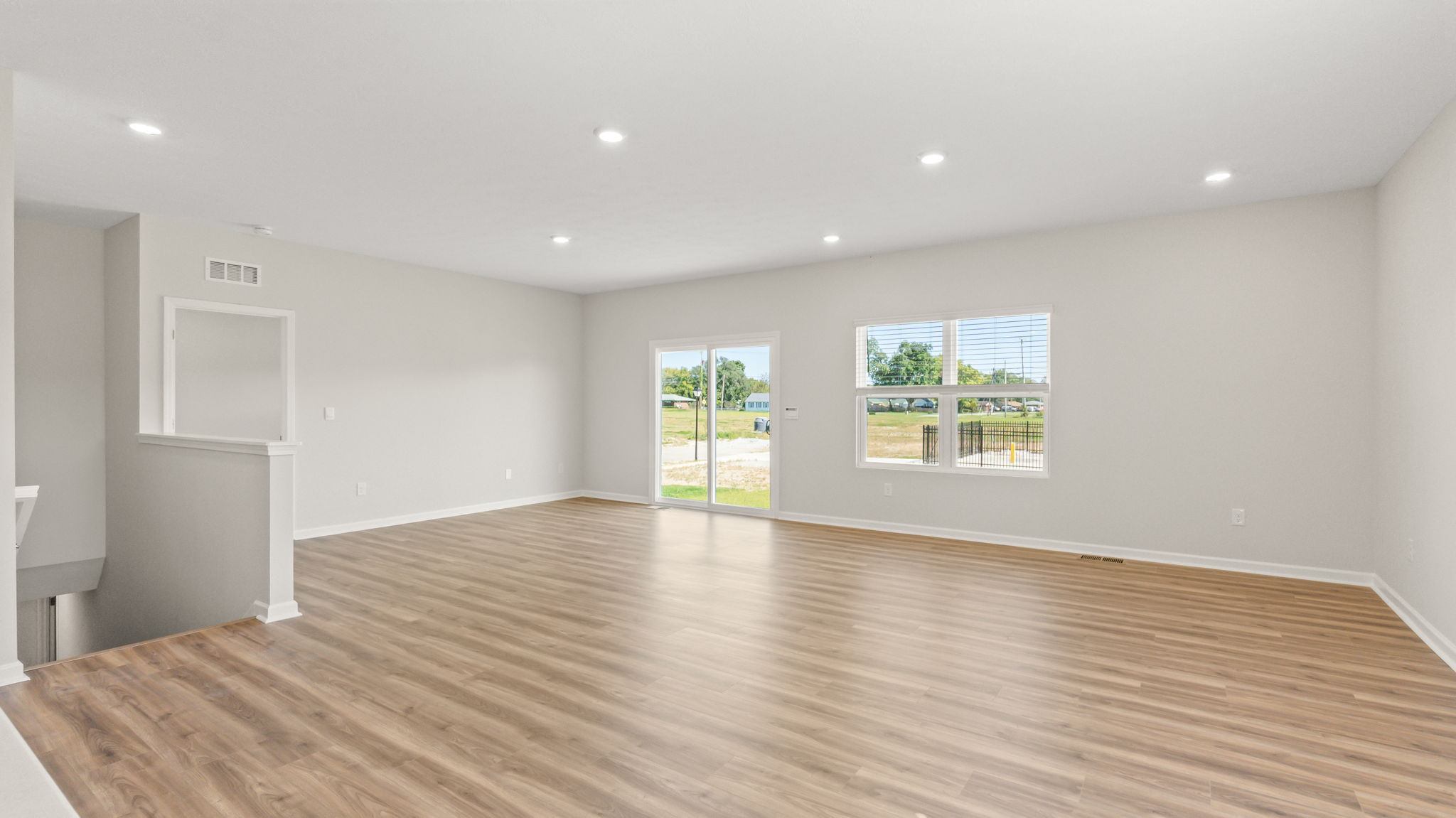 Great area with stairs leading to a basement