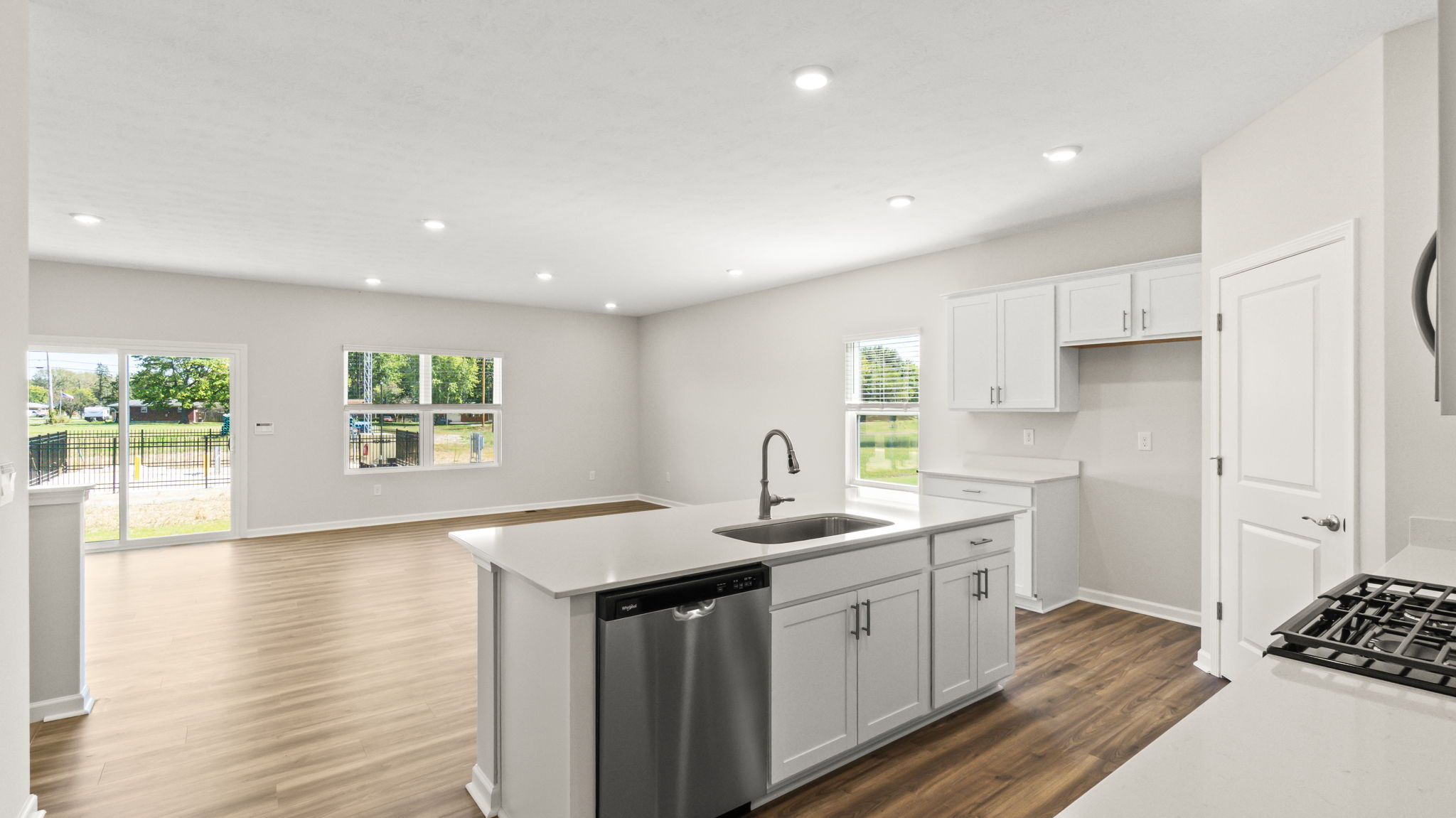 Wide angle of kitchen and dining area