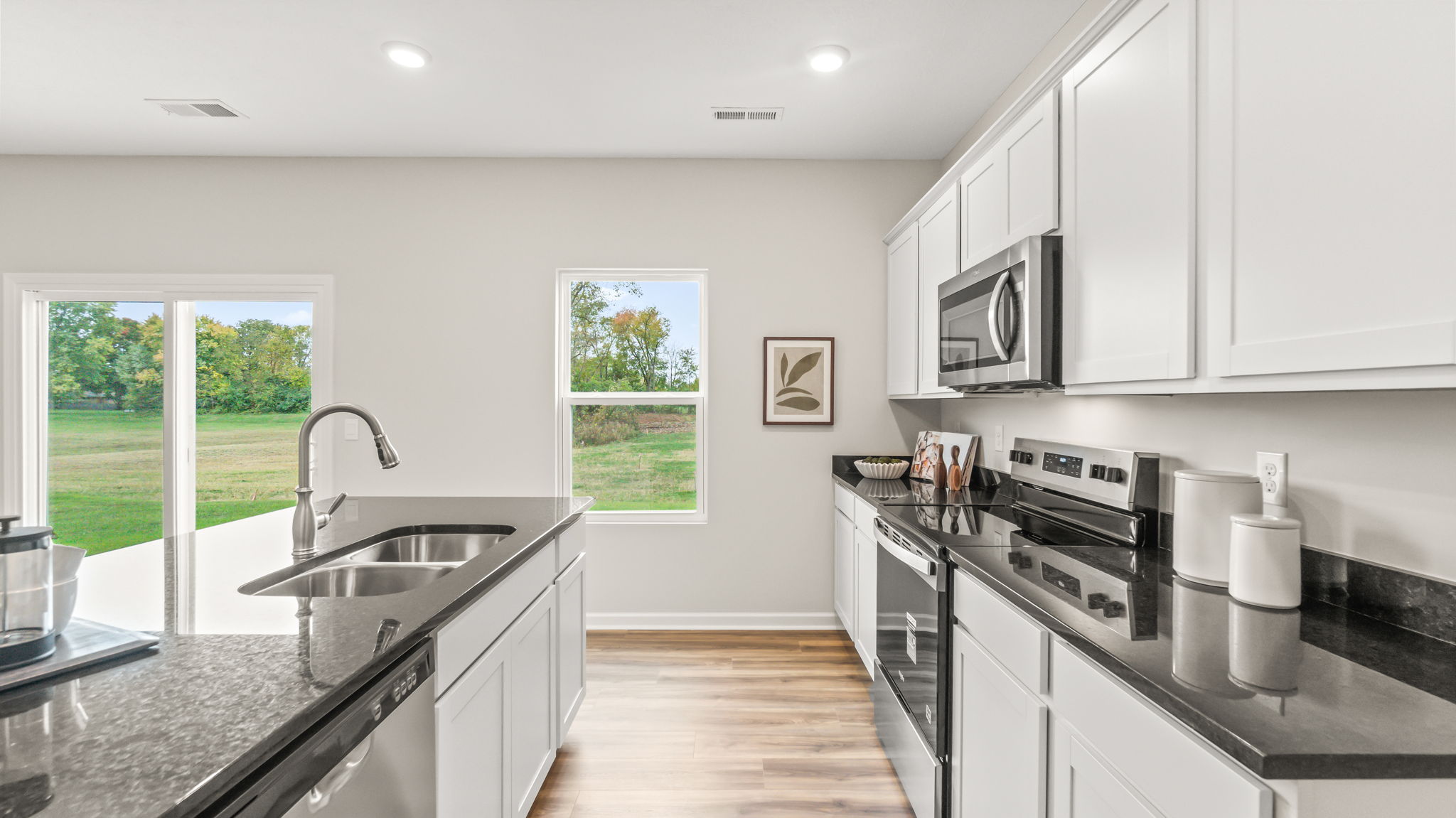 Side view of kitchen with granite countertops