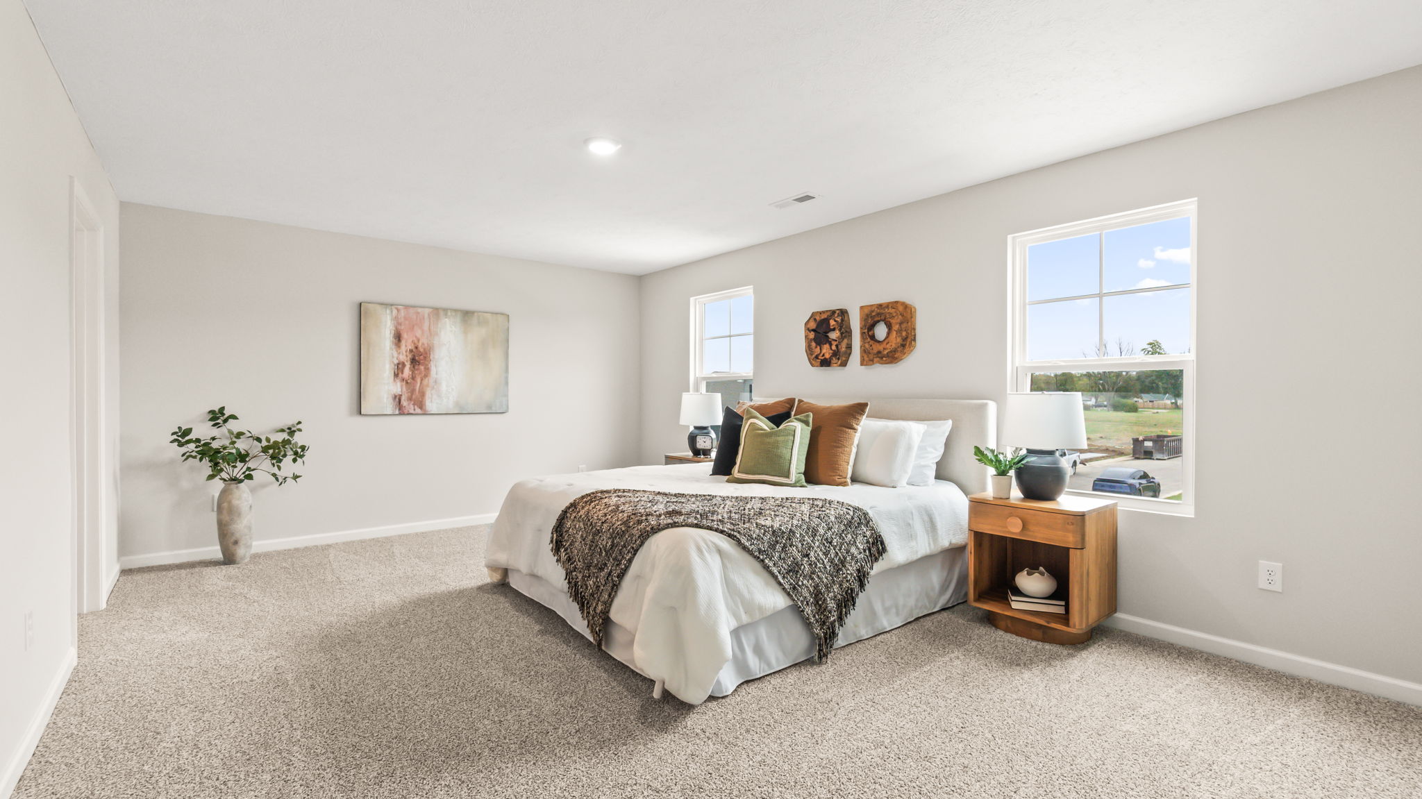 Carpeted primary bedroom