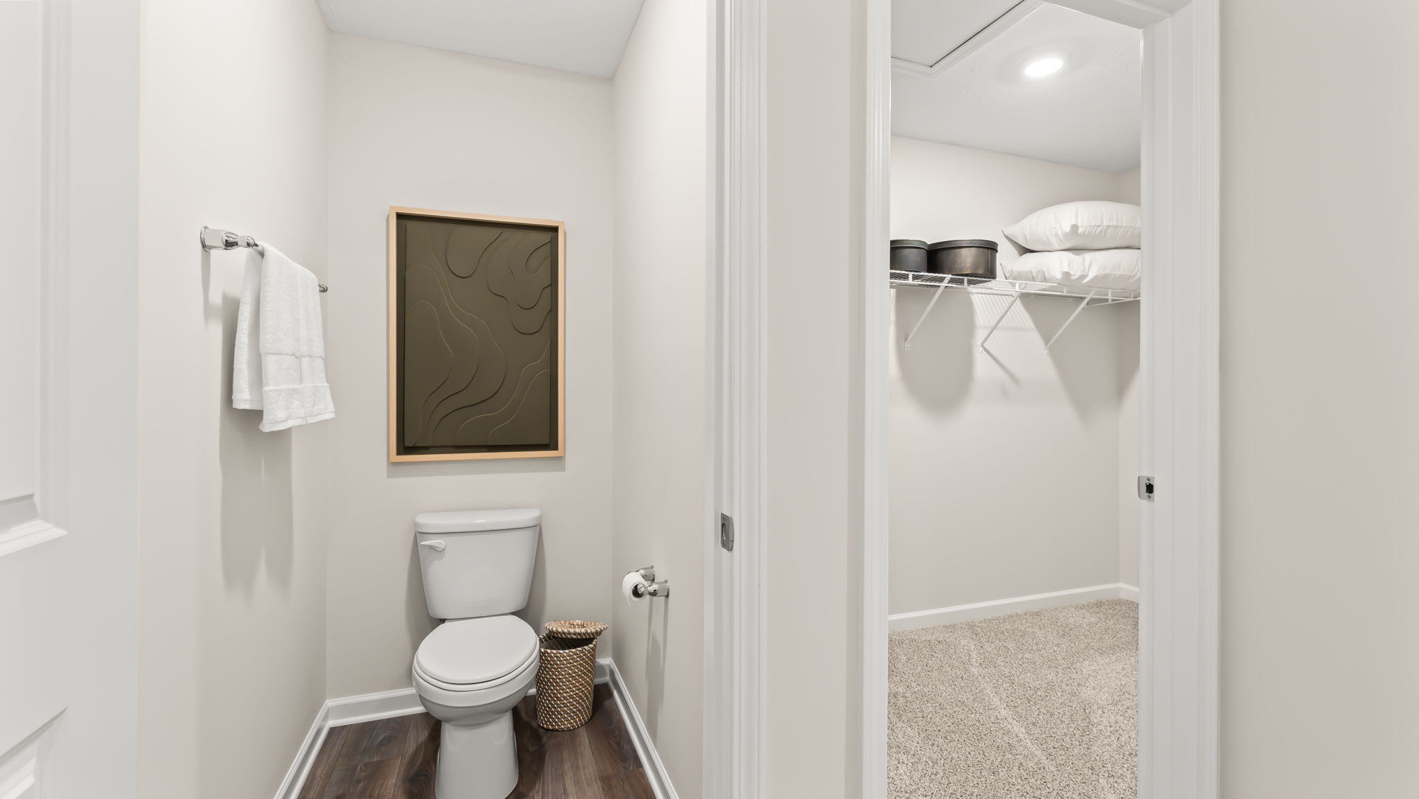 Toilet room of primary bathroom suite