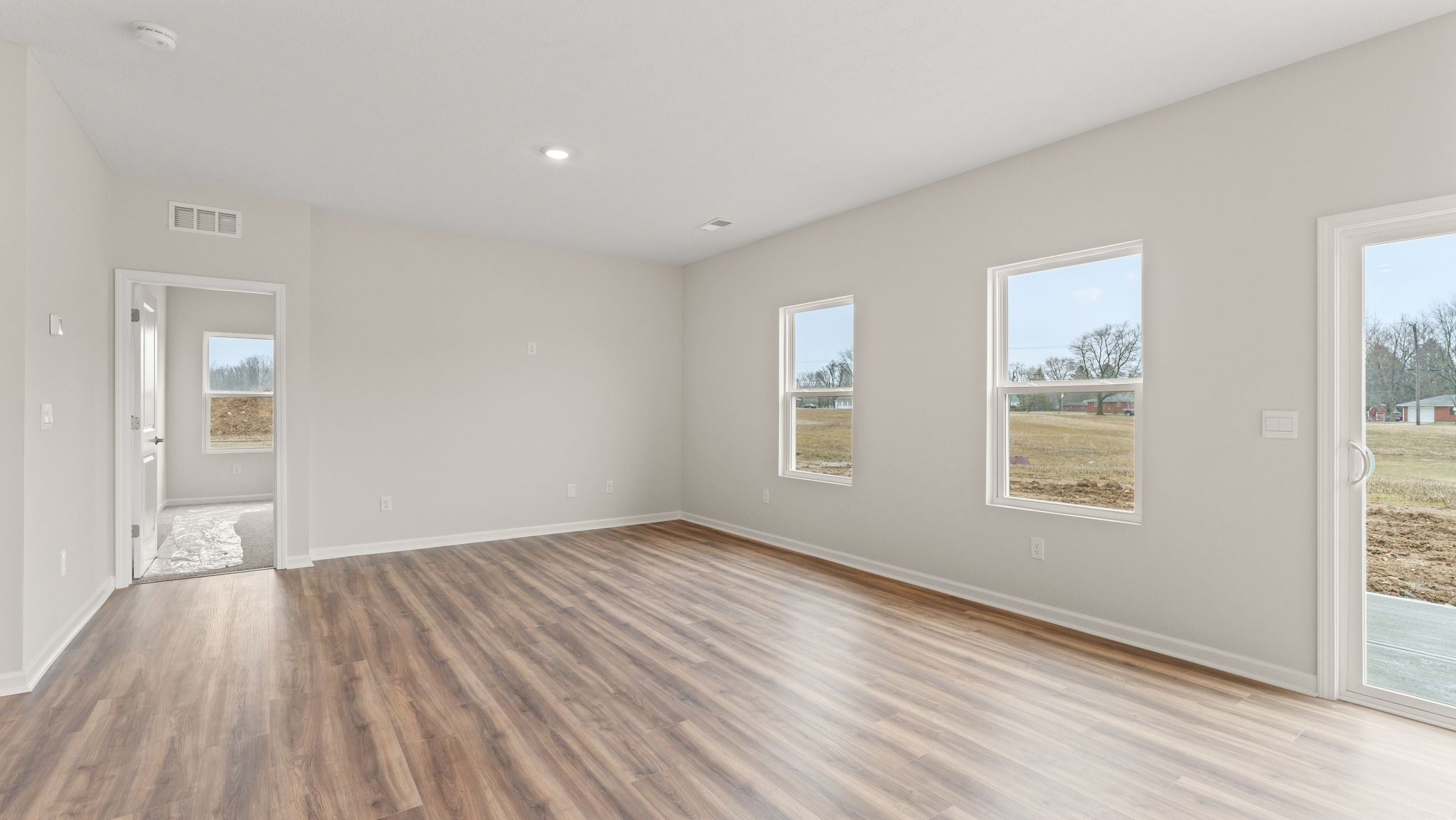 Full great room with two windows on the right