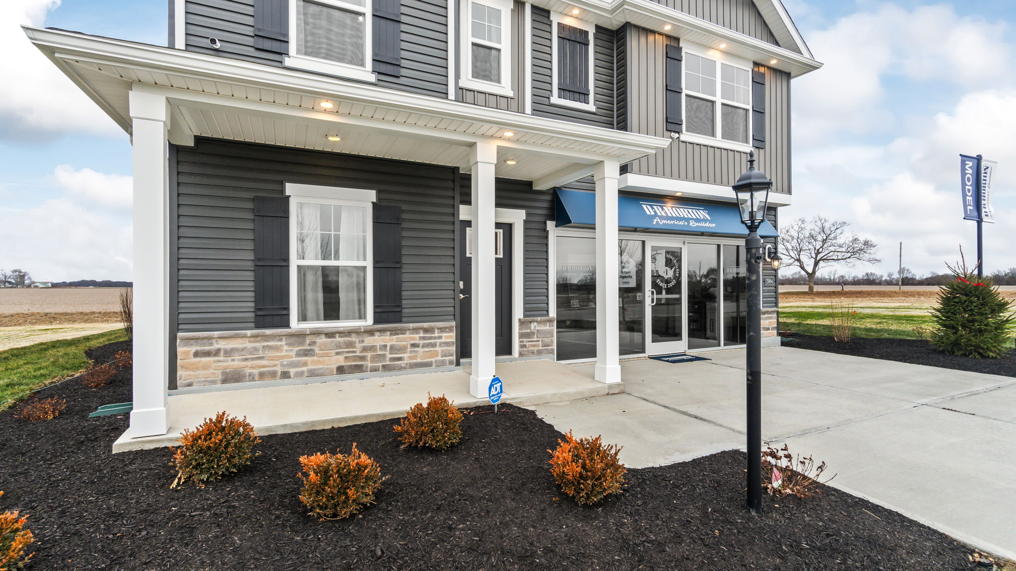 Closeup of Holcombe Model Door and Porch from lefthand side.