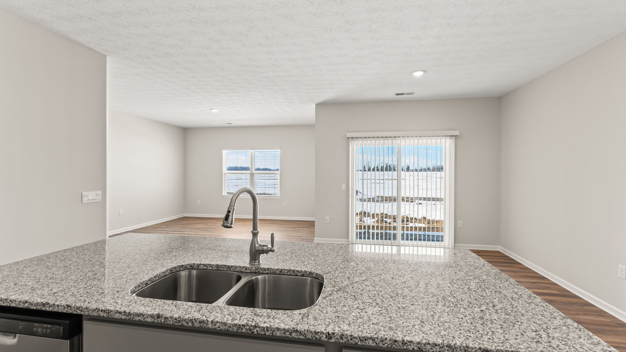 Perspective view of the kitchen island from the sink.