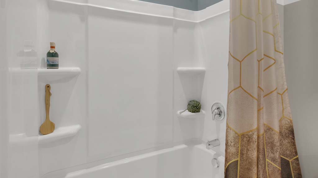 close up on shower in shared bathroom.