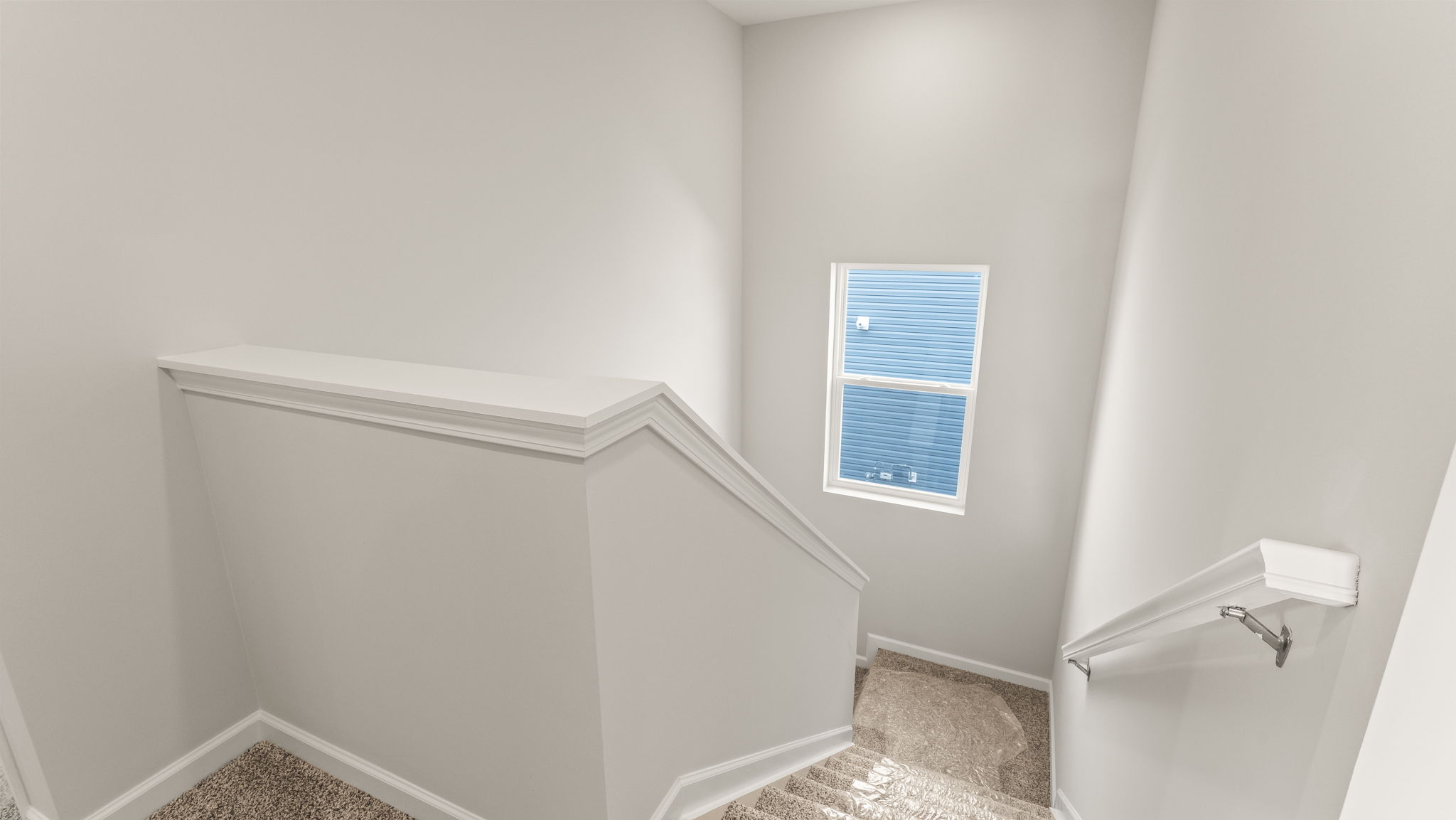 Upstairs landing looking towards first floor.