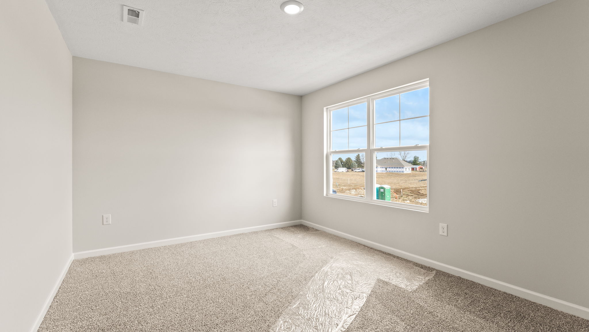 Upstairs loft/flex area with window to outside.