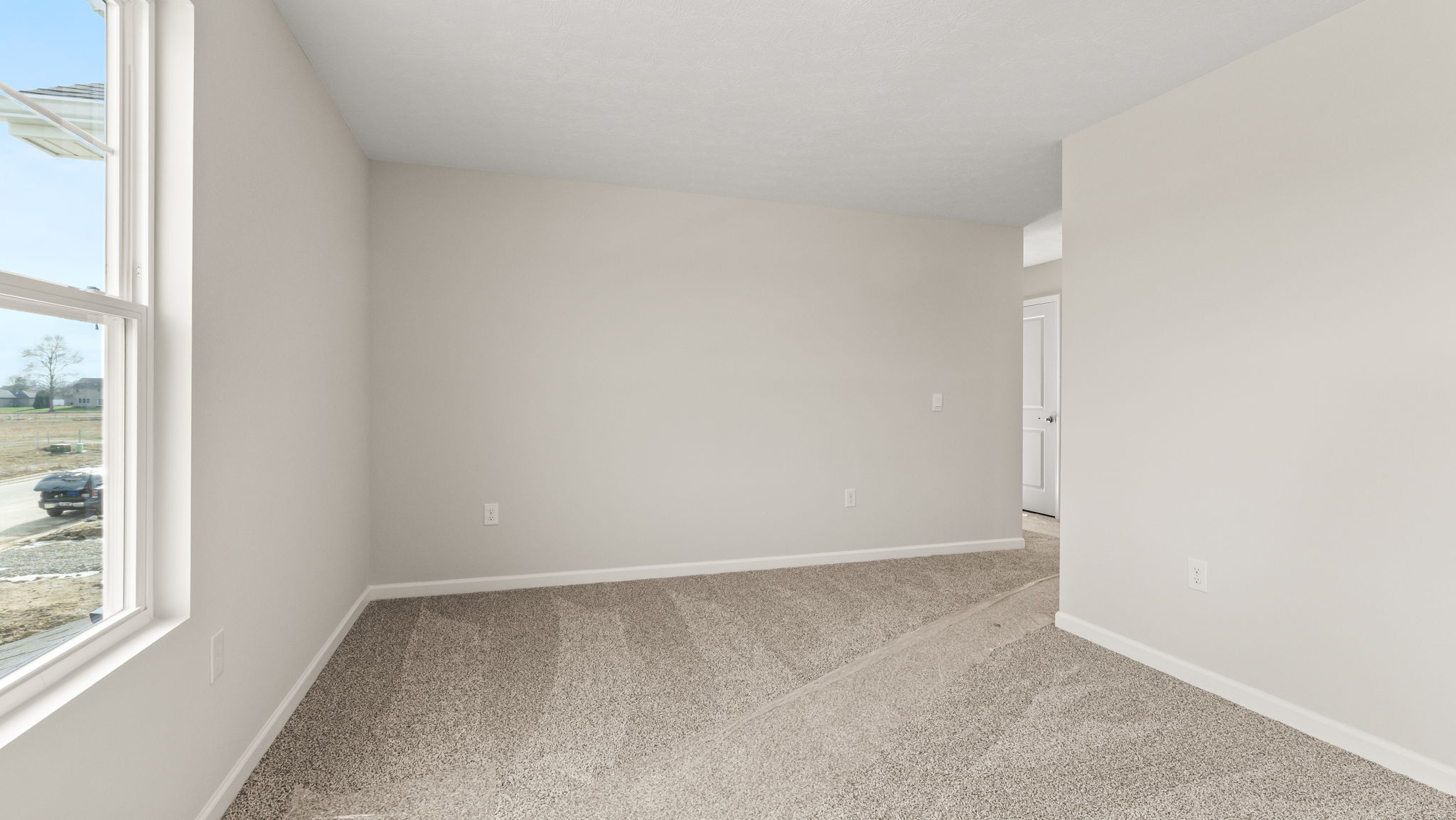 Upstairs flex area looking into hallway