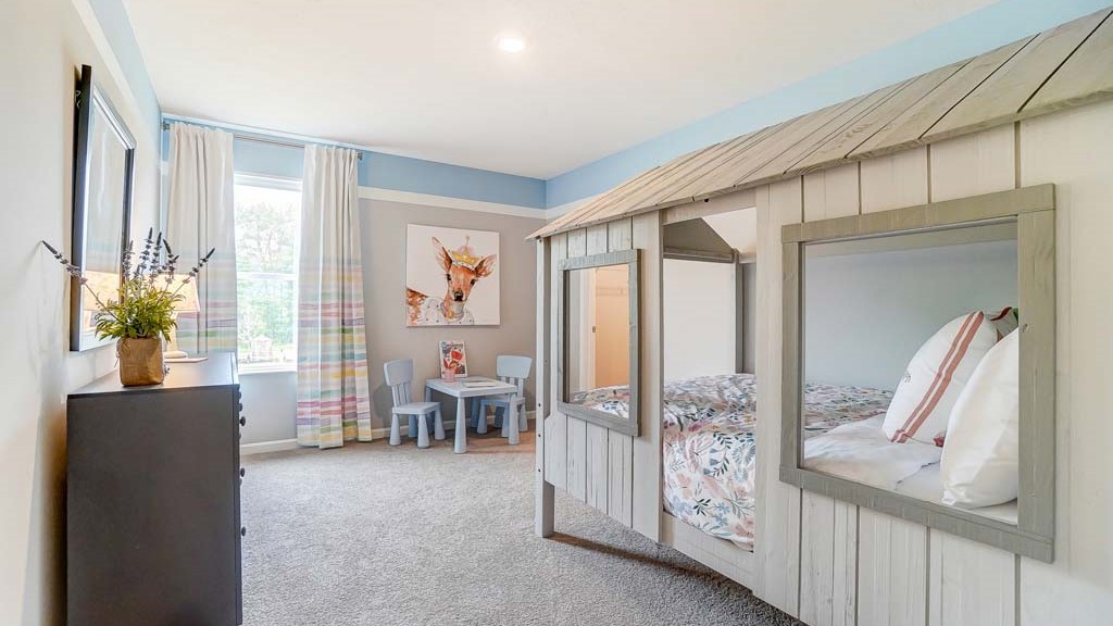 Bedroom with kid themed decorations.